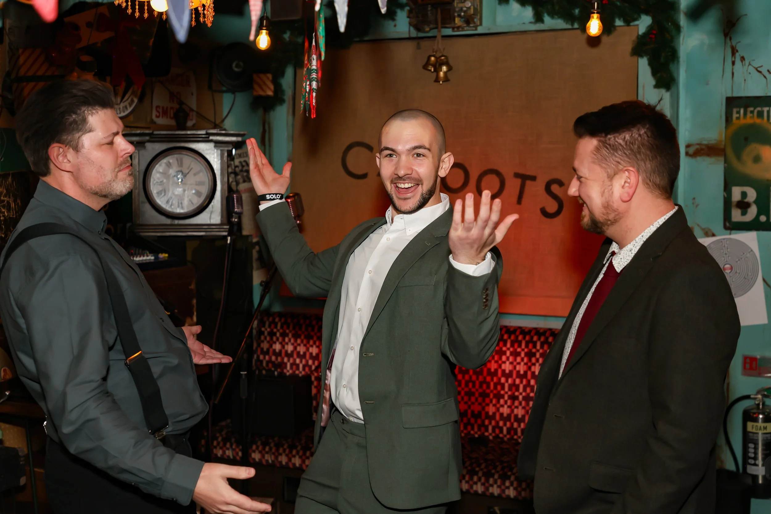 Corporate guests participating in a live interactive magic performance.