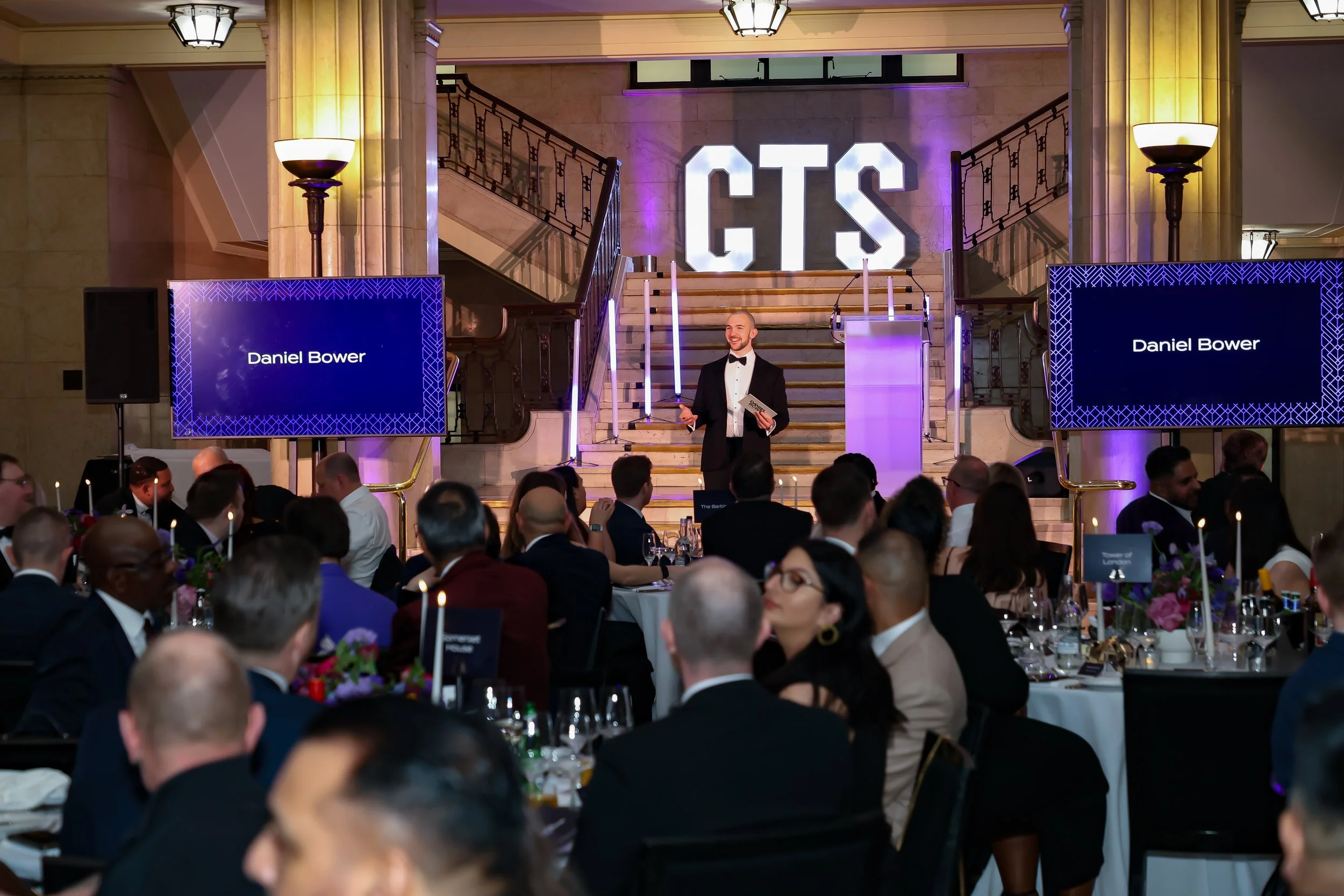 A polished event host & magician leading the flow effortlessly, maintaining momentum and a lively atmosphere throughout.