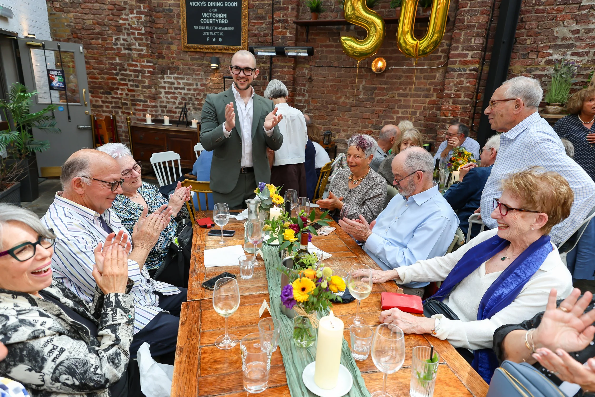 The guests enjoyed their time with the Magician and his tricks. 2026-May 3 Rhoda & Baruch Golden Anniversary. 