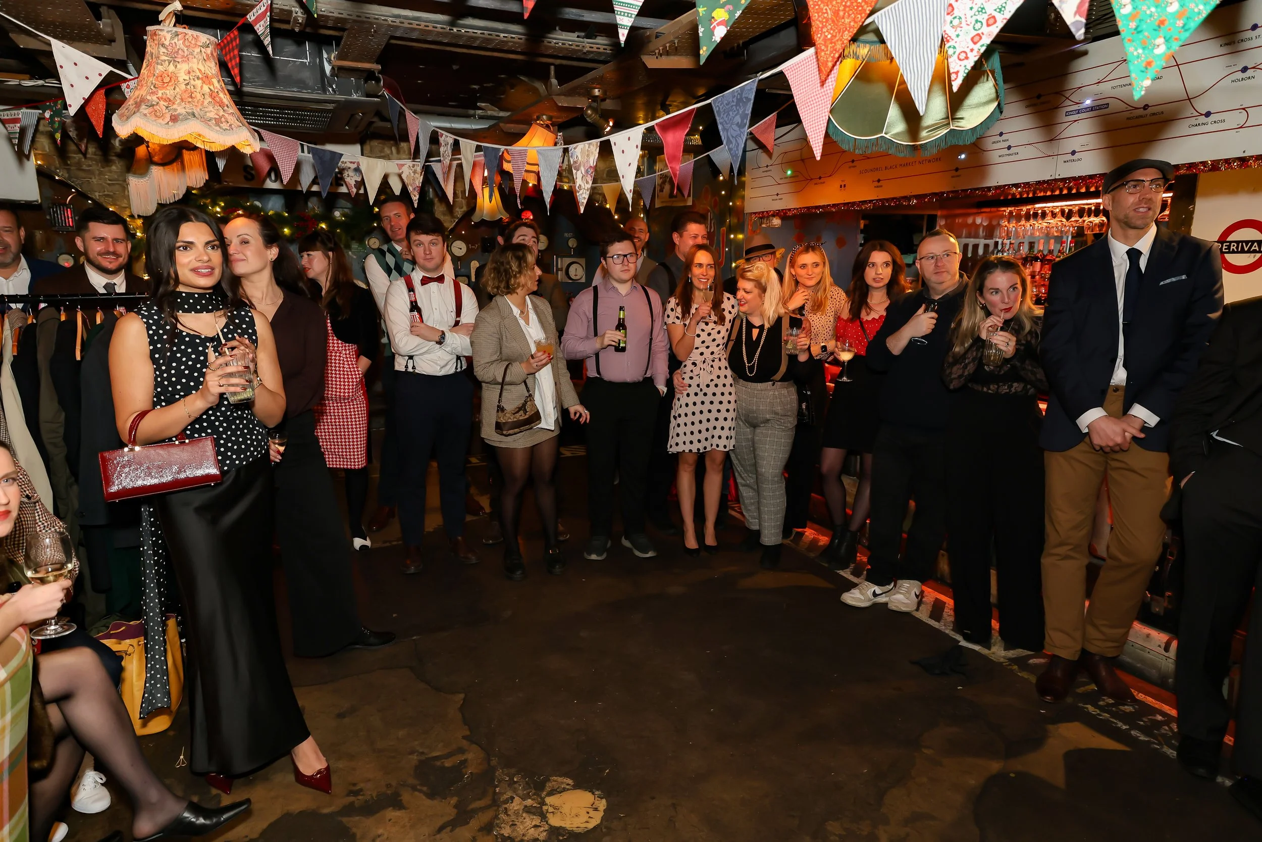 Magician performing walk-around magic for guests at reception