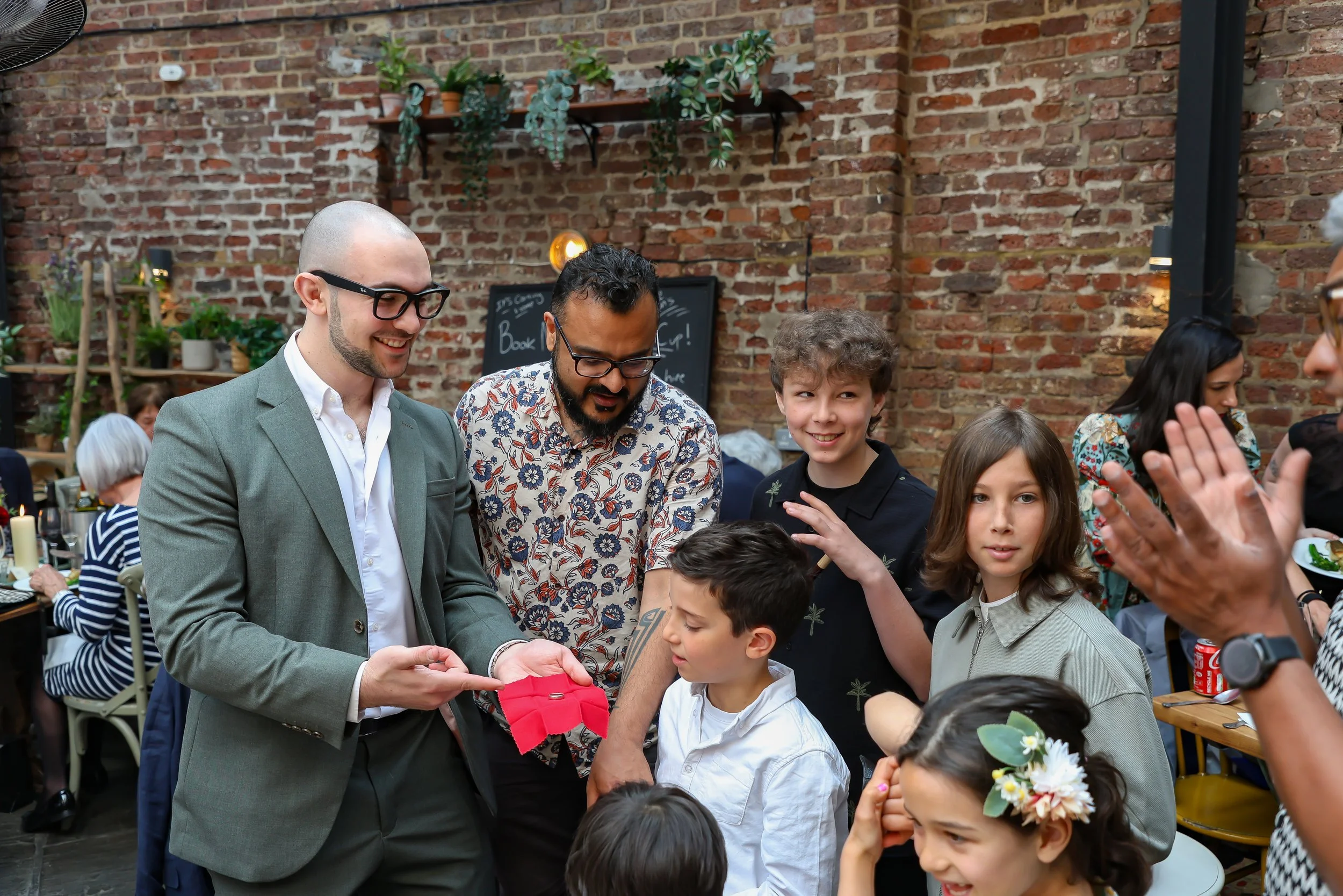 Kids love the moment with the Magician. 2026-May 3 Rhoda & Baruch Golden Wedding Anniversary. 