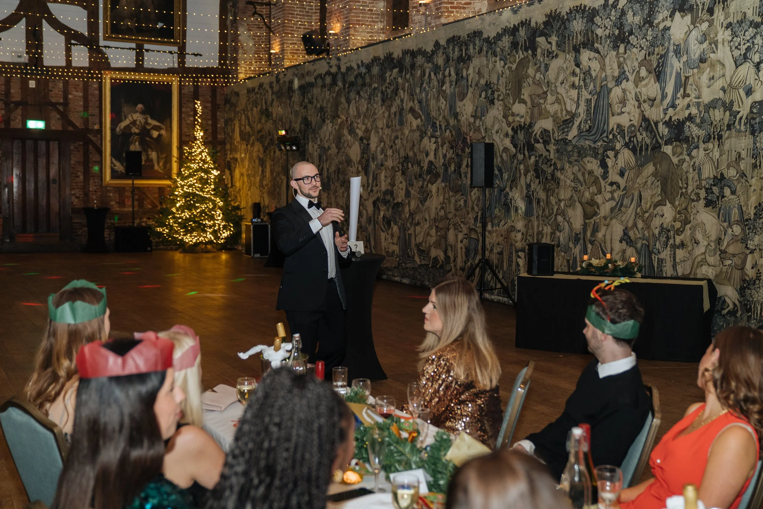 Live magic entertainment delivered to business professionals at a company dinner.