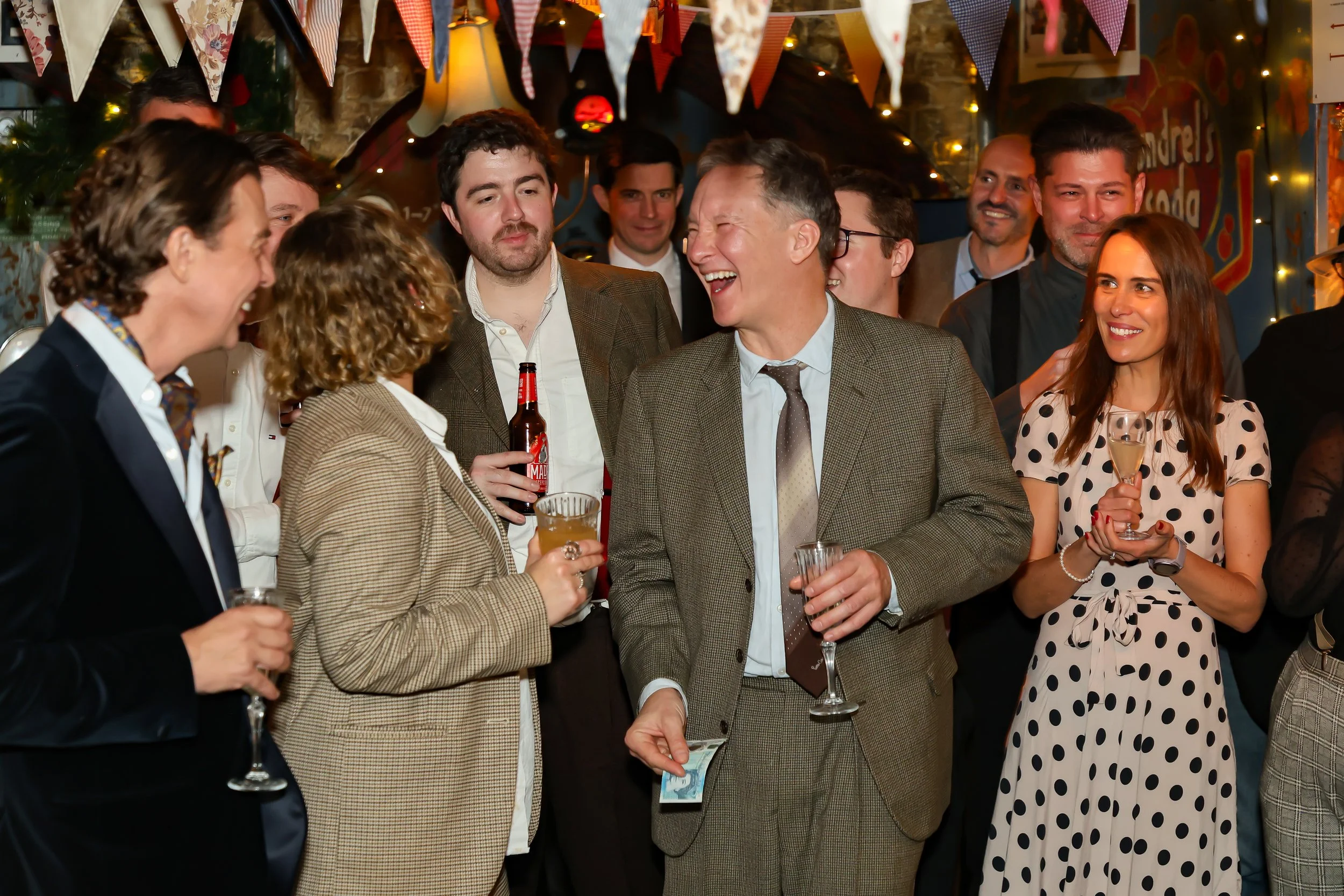 Side-table magic entertaining guests during a corporate social event.