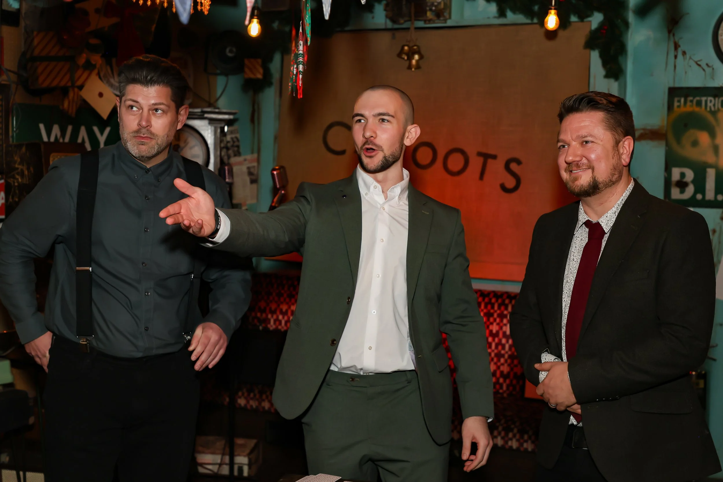 Guests actively involved in an interactive magic show during the event.