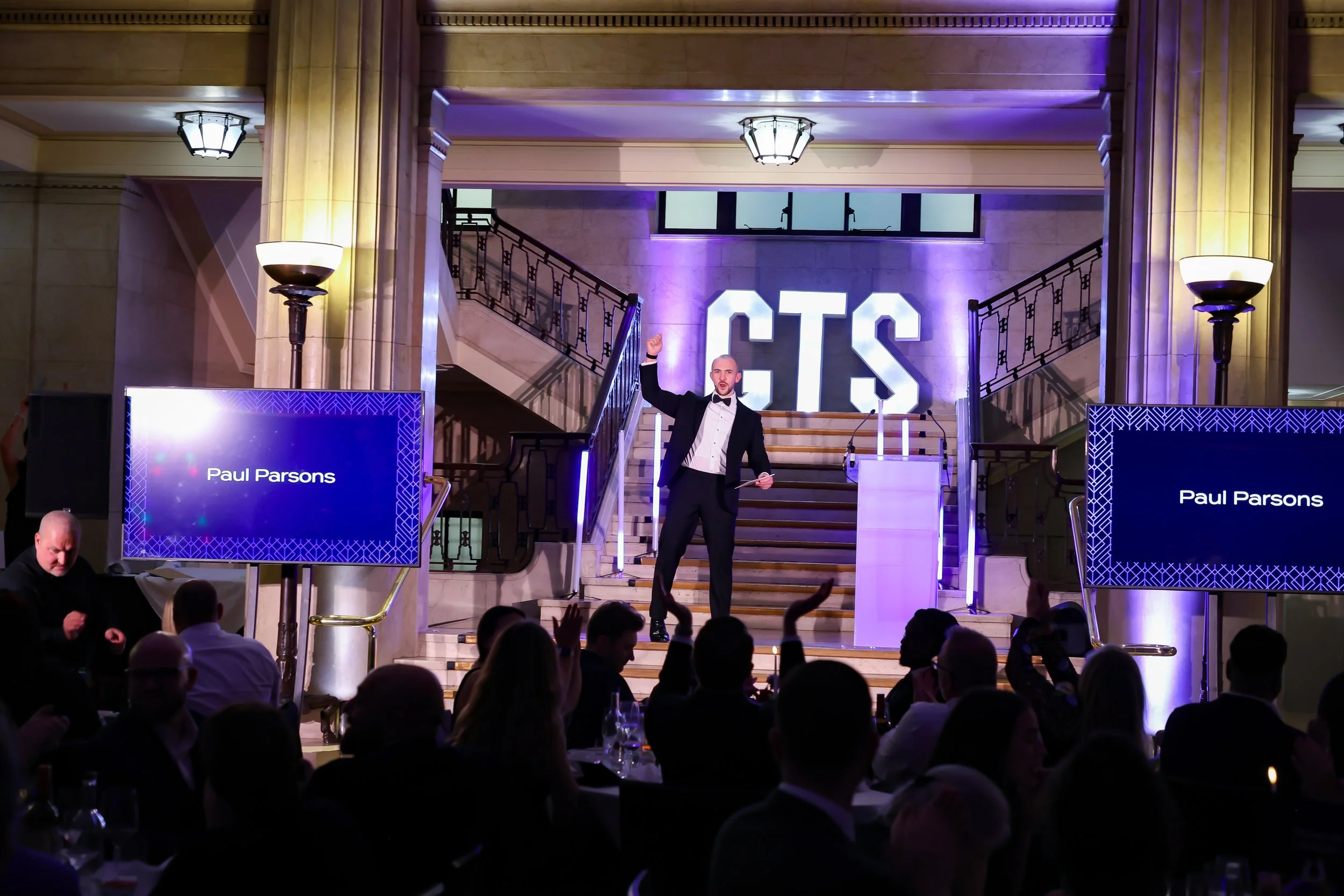 A dynamic event host creating energy, clarity, and continuity across every stage of the event.