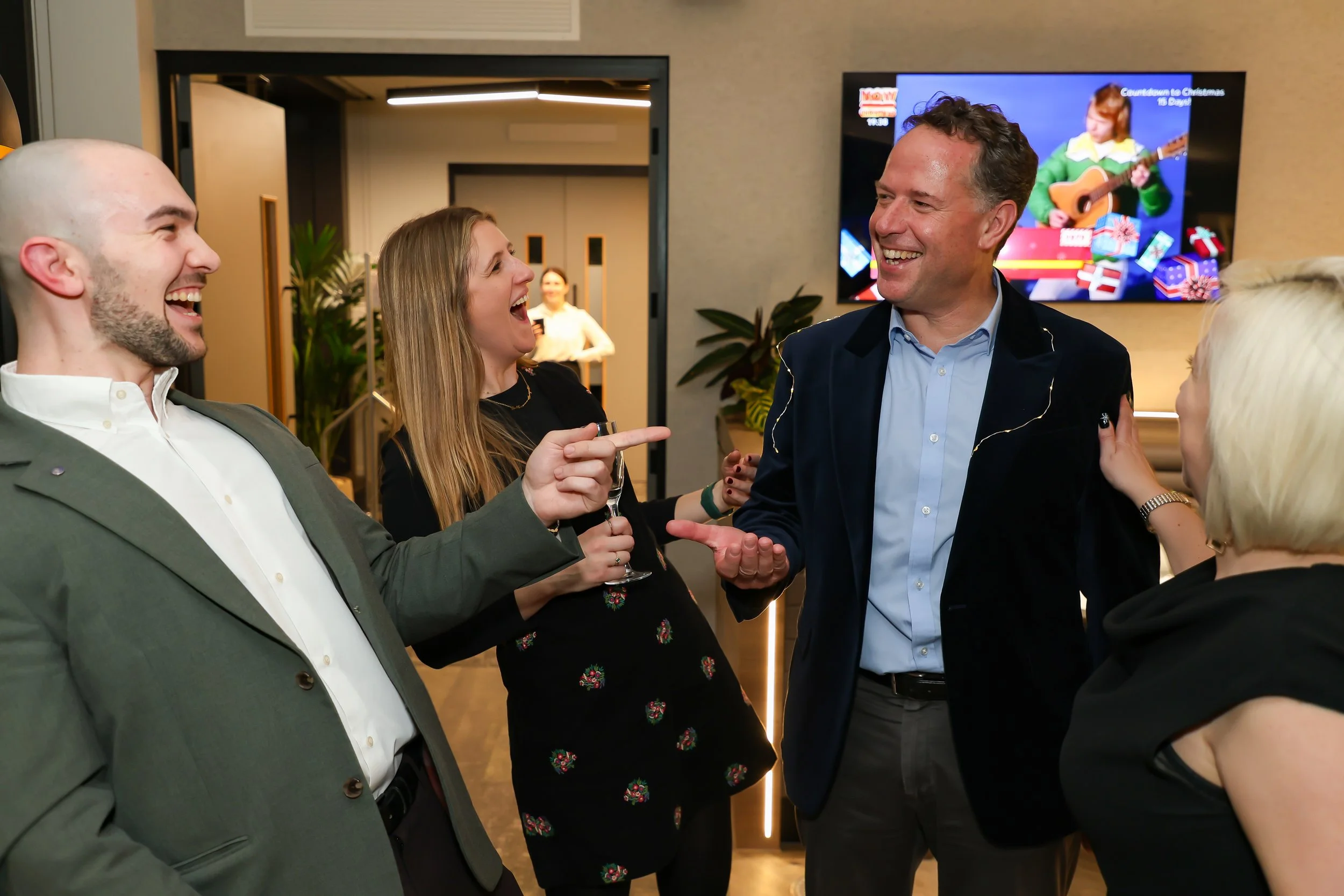 Close-up card magic leaves corporate guests amazed.