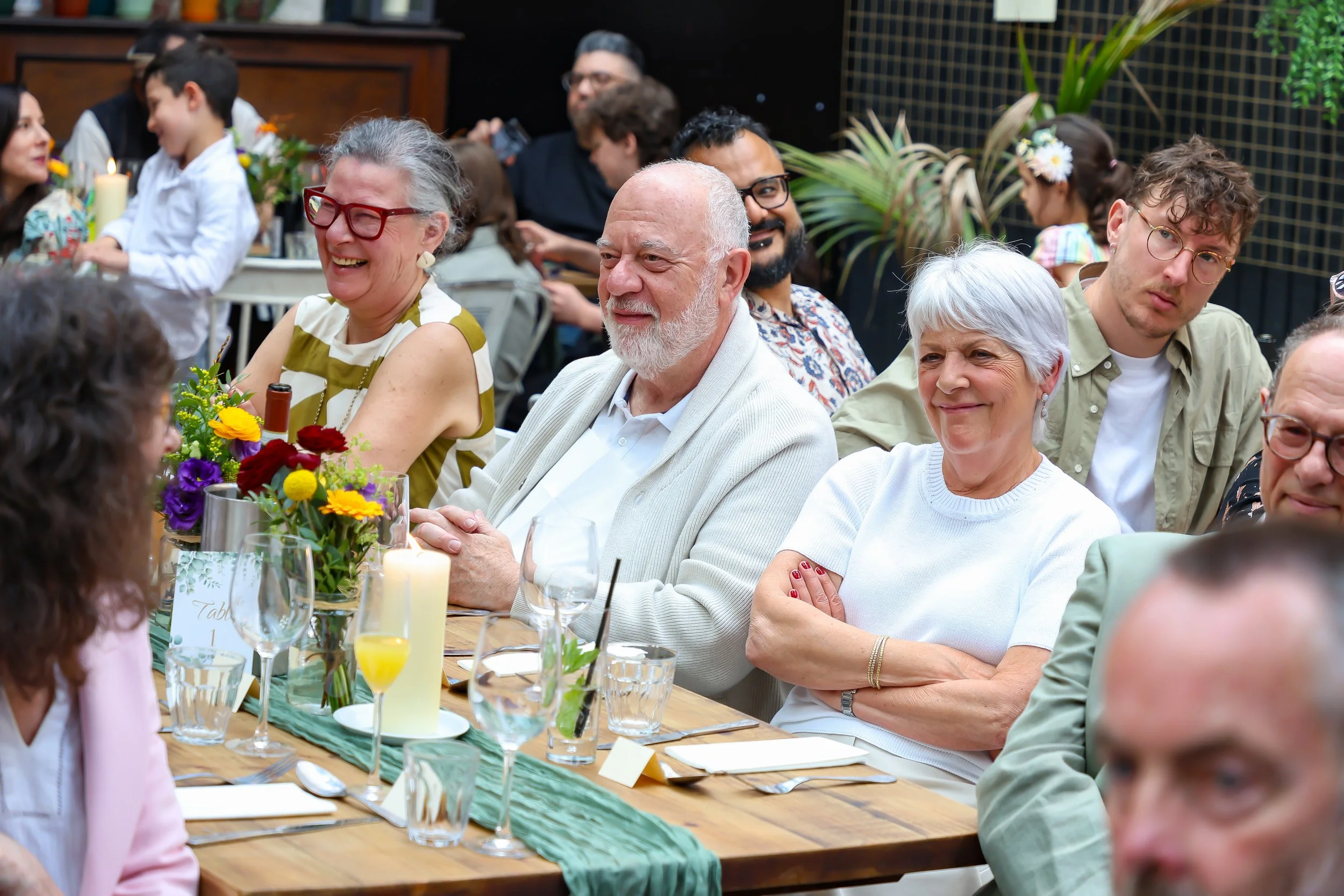Listen and enjoying attentively to Baruch on 2026-May 3 Rhoda & Baruch 50th Wedding Anniversary.