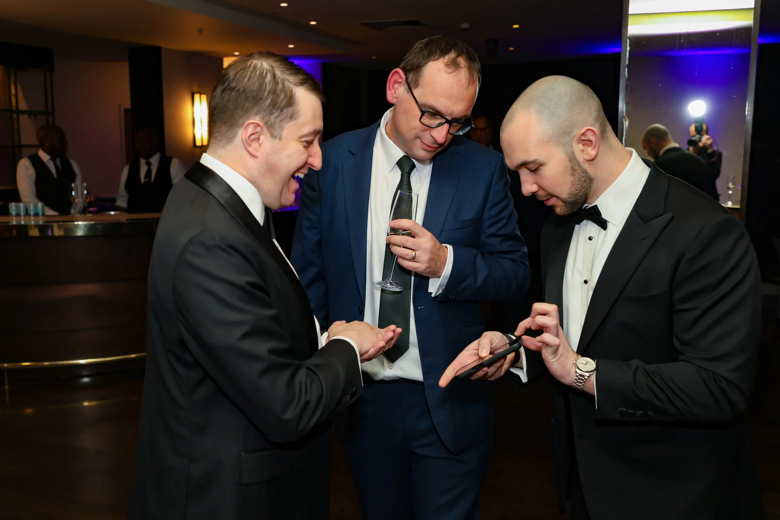 Corporate leaders enjoyed the trick of the UK magician. 