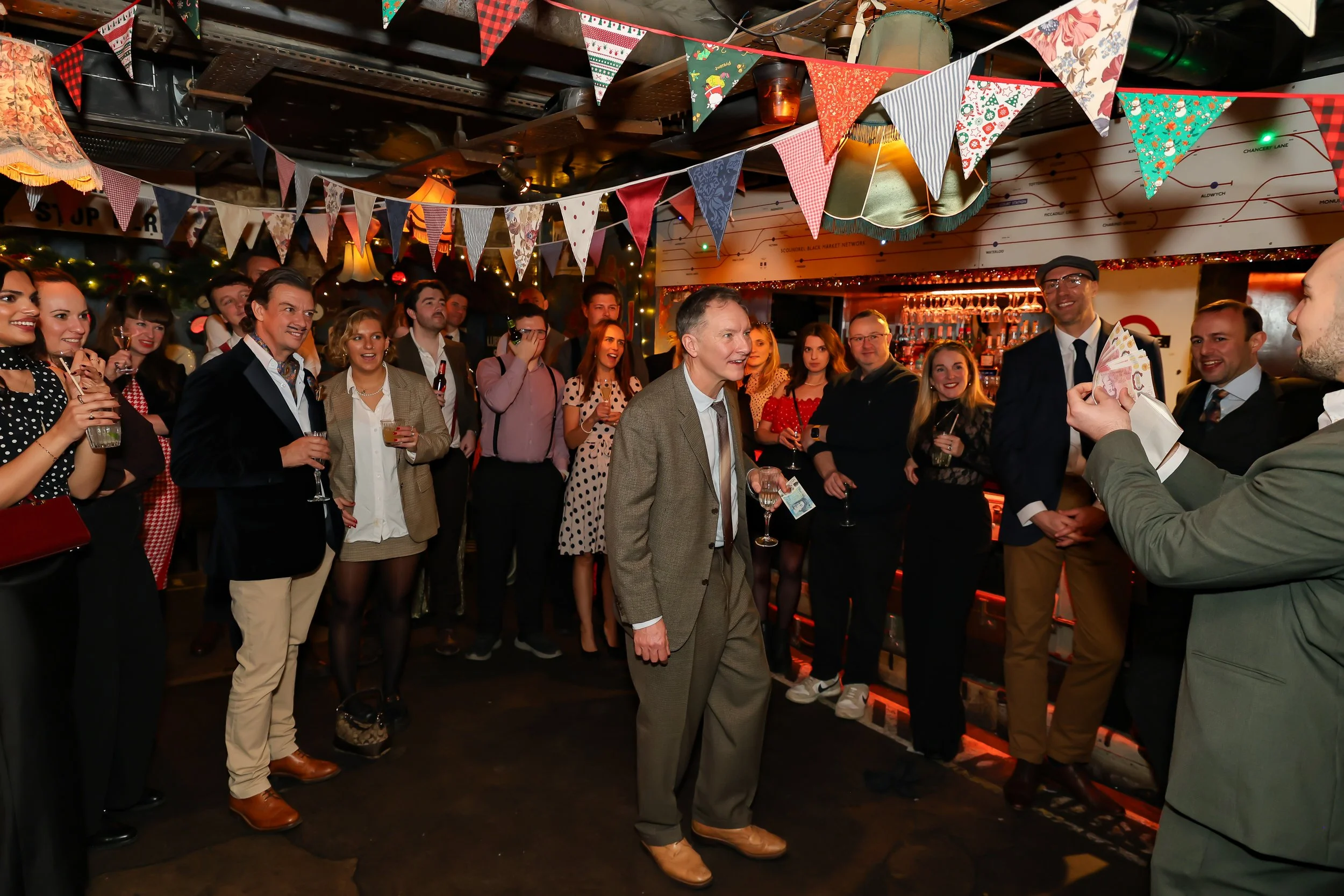 Audience members taking part and enjoying the interactive magic experience.