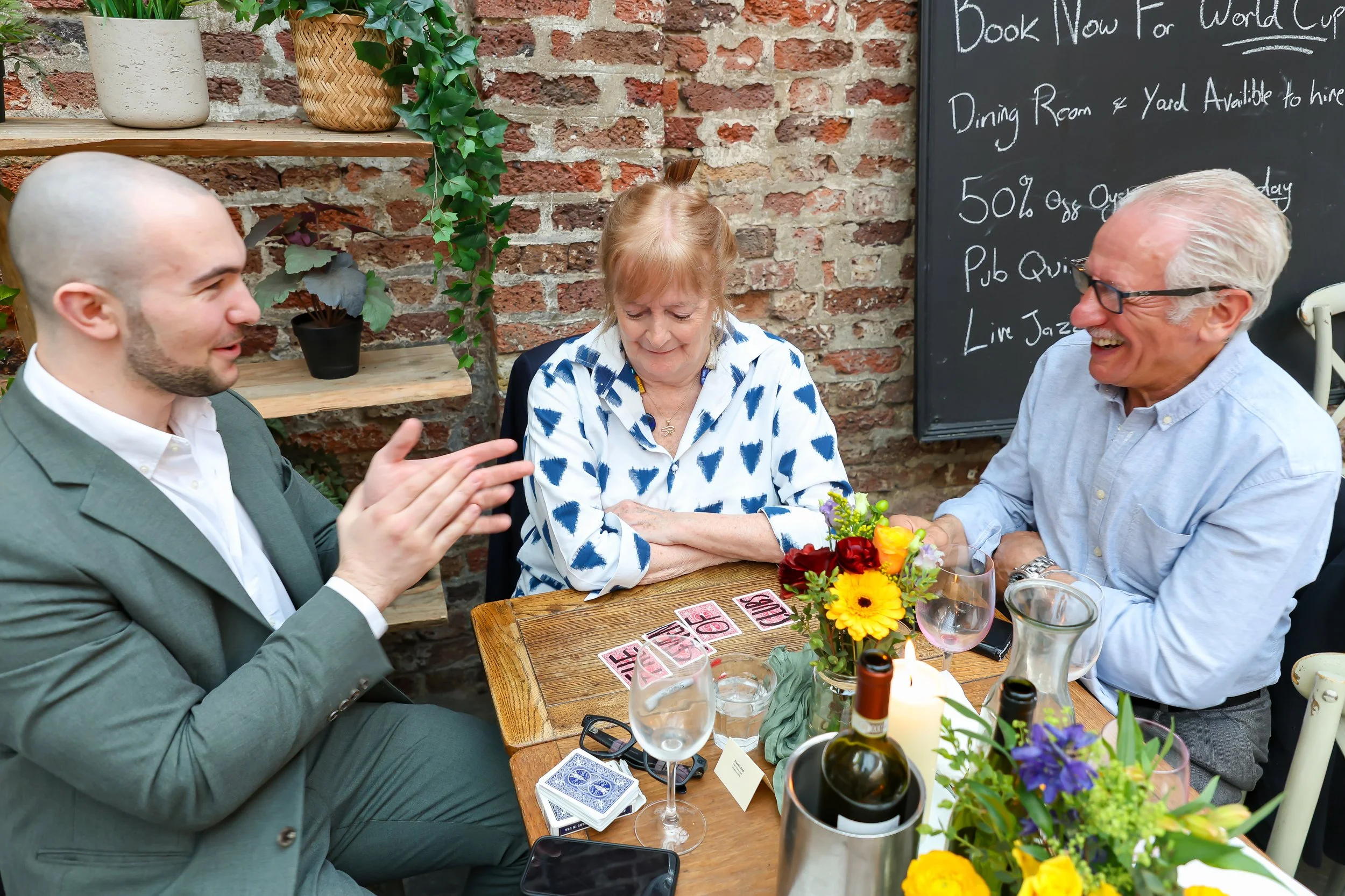 Guests love and enjoying to witness the close-up magic to happen. 2026-May 3 Rhoda & Baruch Golden Wedding Anniversary. 
