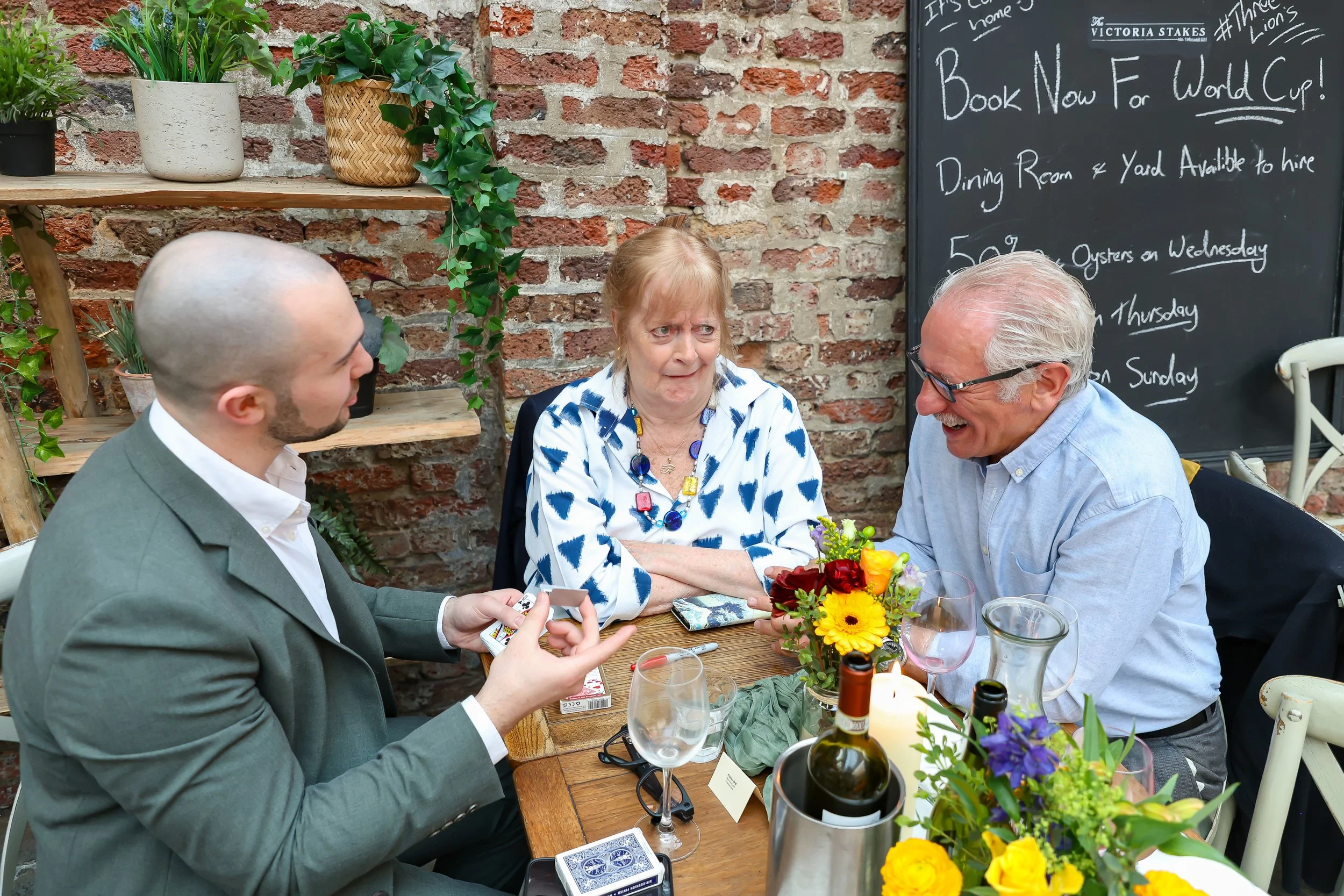 Guests love and enjoying to witness the close-up magic to happen. 2026-May 3 Rhoda & Baruch Golden Wedding Anniversary. 