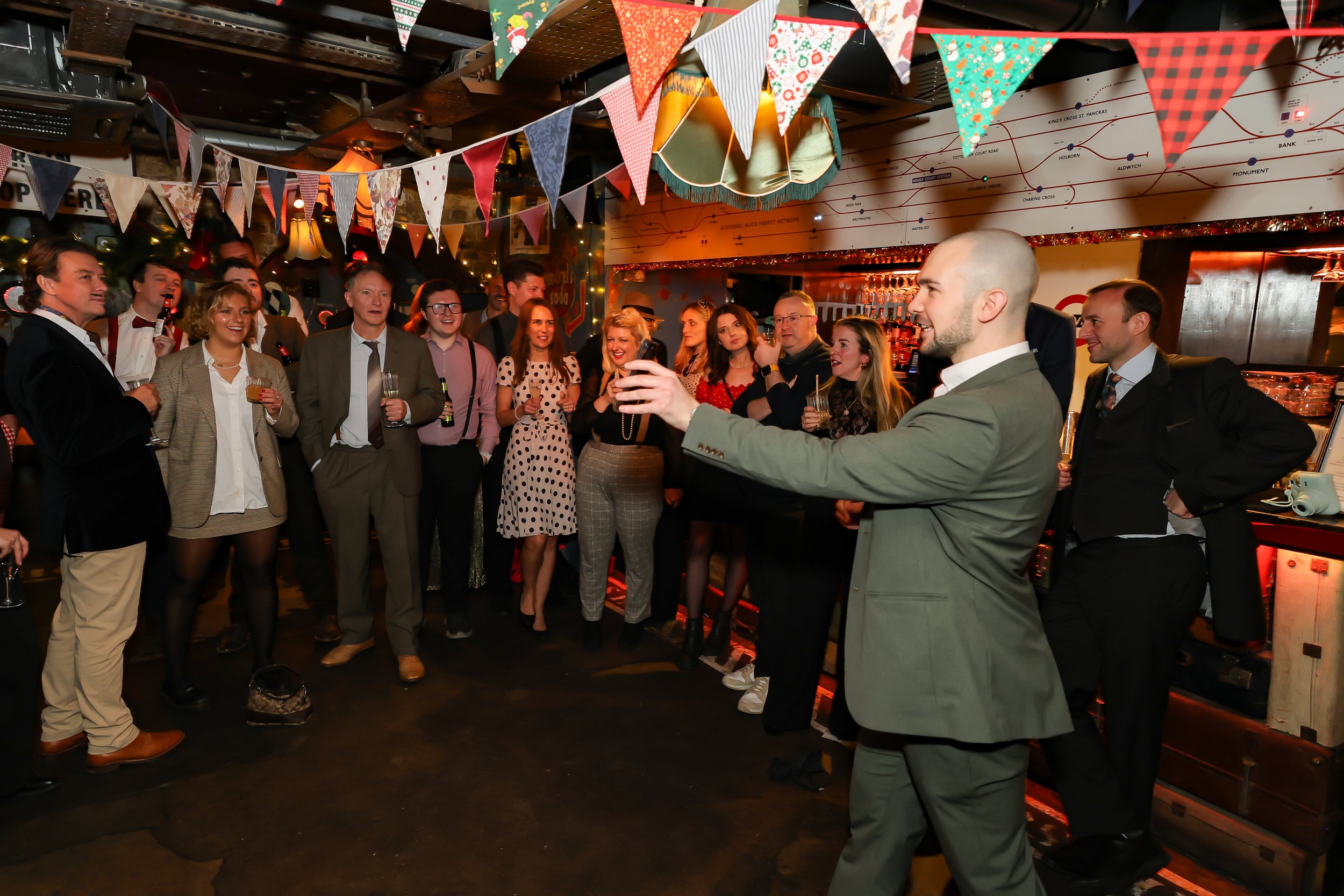 Interactive walk-around magic during corporate event reception.