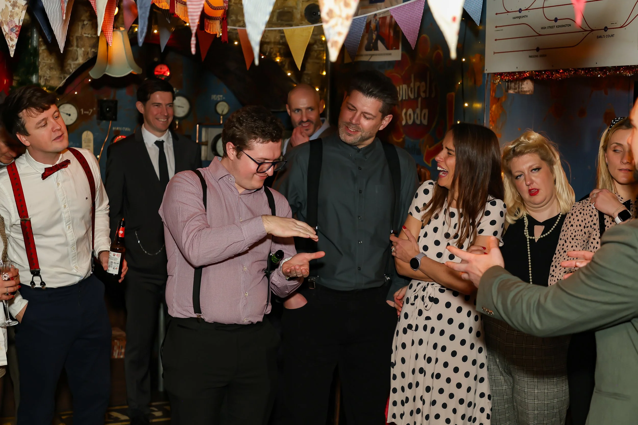 London Magician performing walk-around magic for guests at reception.