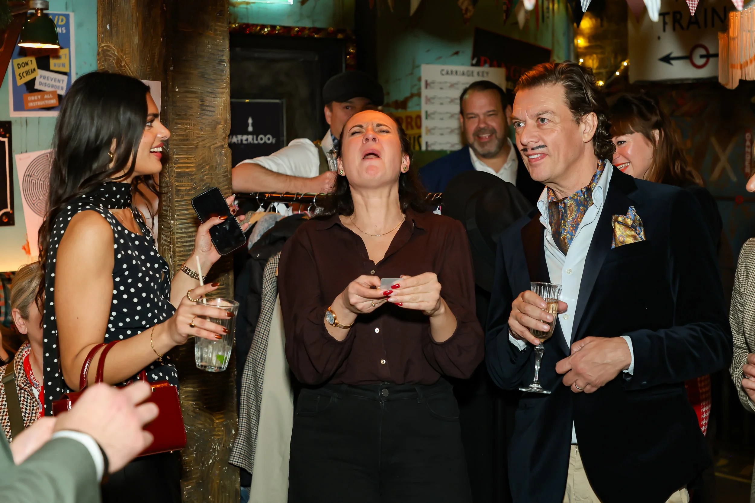 Side-table magic entertaining guests during a corporate social event.