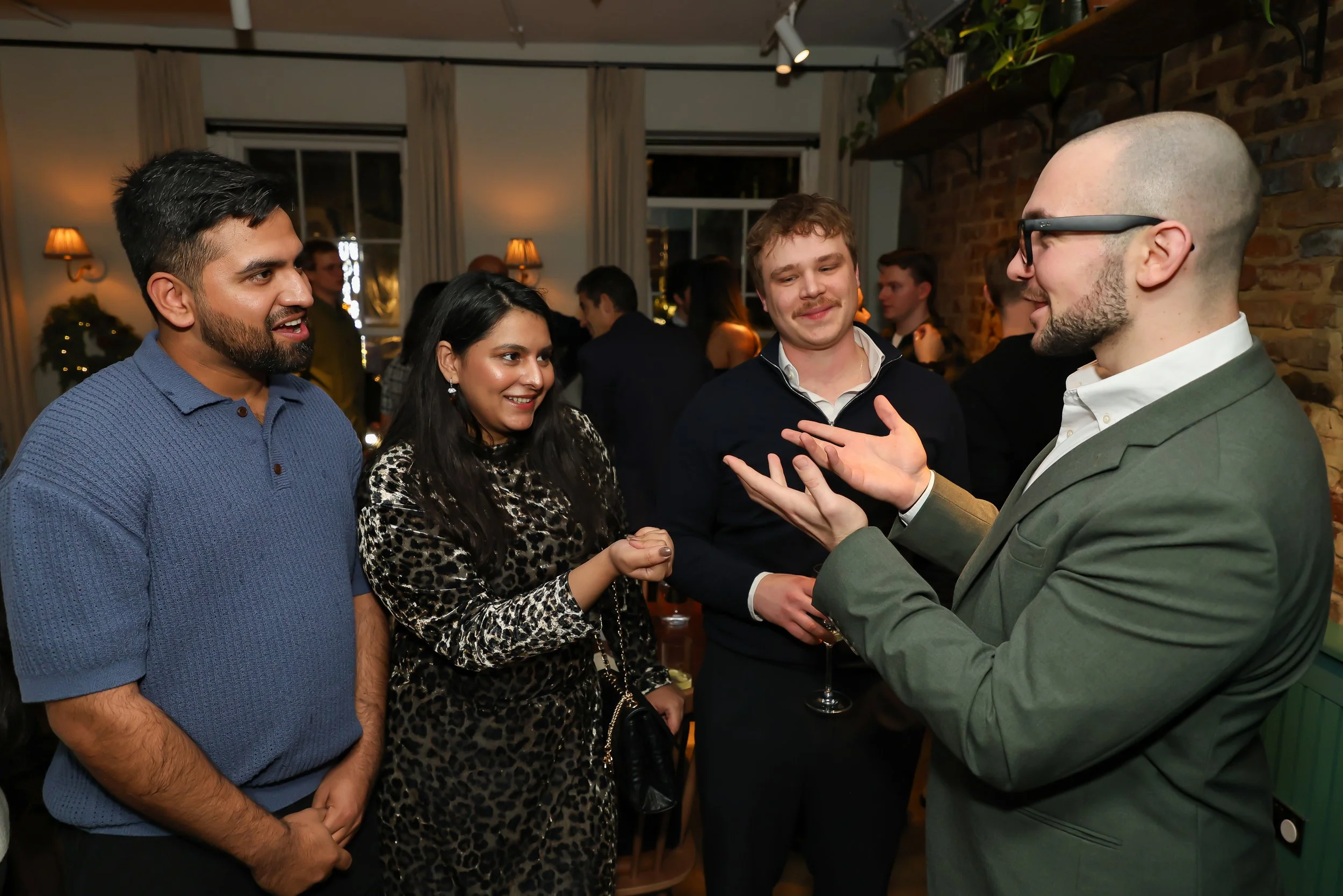 Interactive close-up magic delivering memorable moments of laughter for a small group during event reception. 
