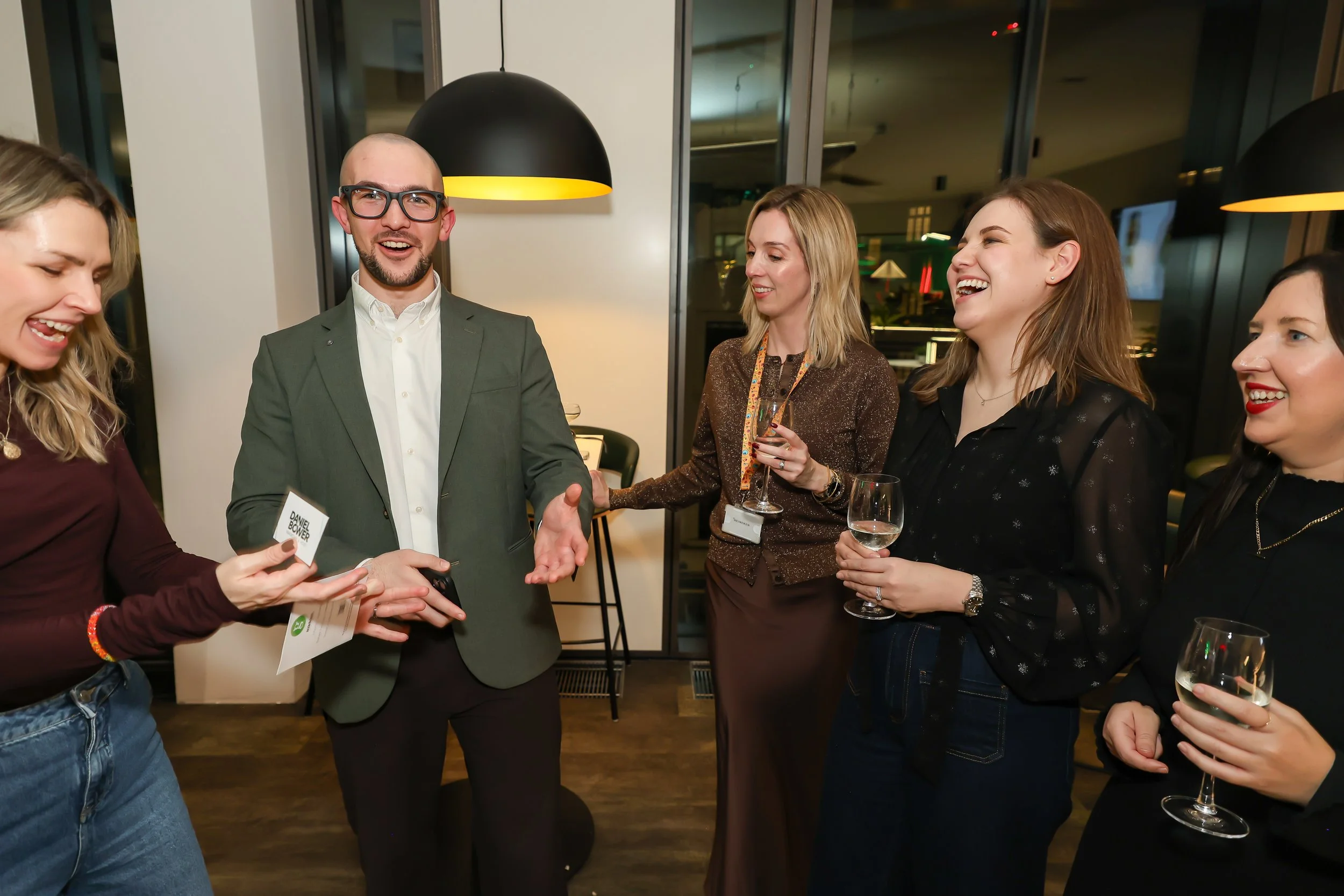 Magician's interactive card trick involve guest at a corporate event.