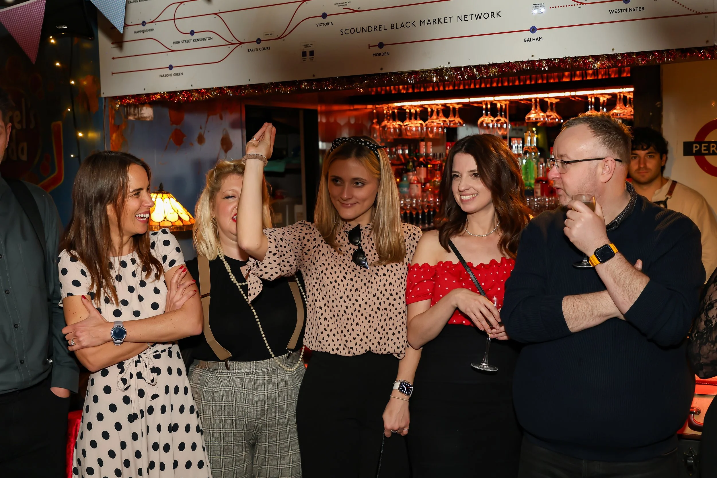 Interactive walk-around magic during corporate event reception.