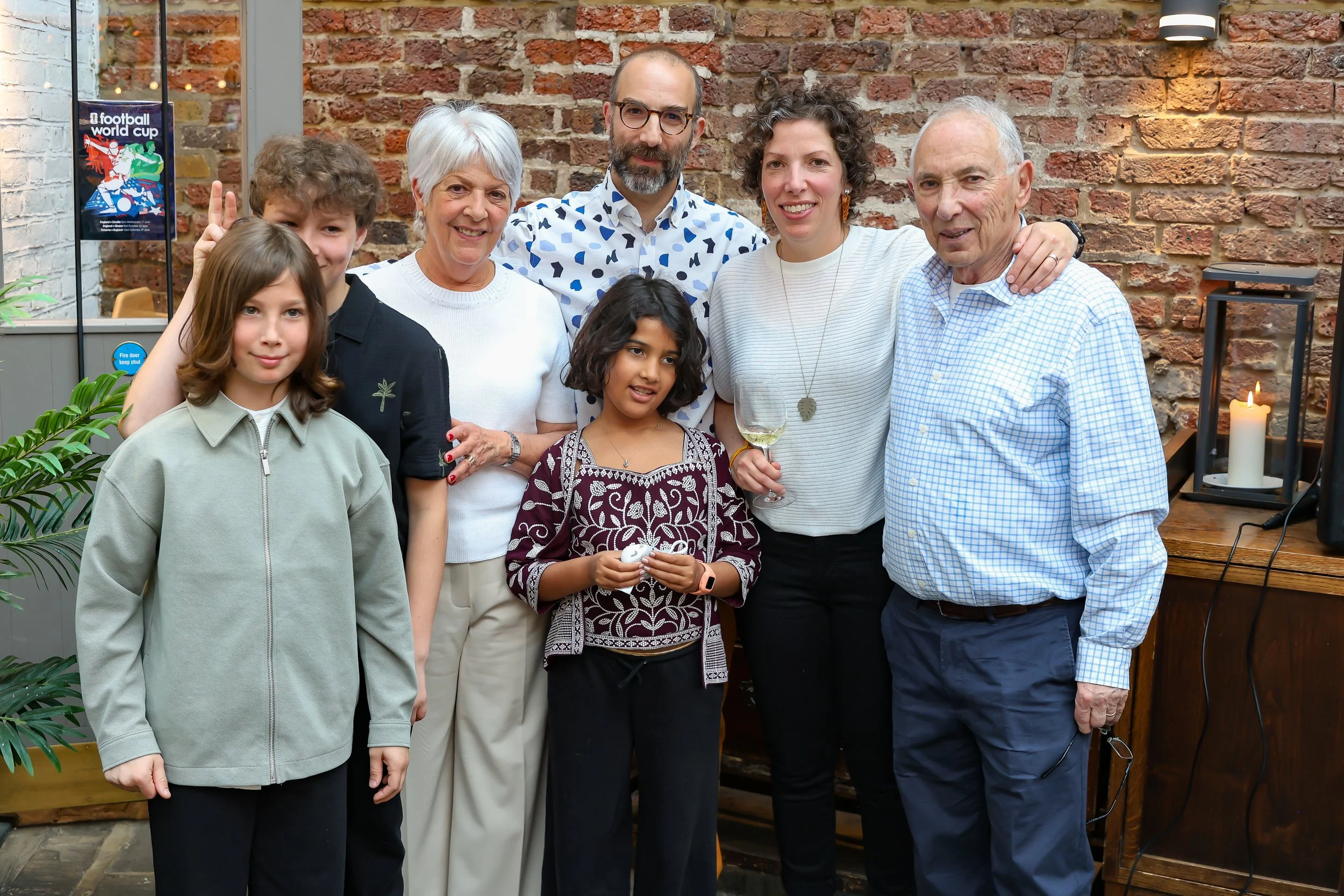 With children and grandchildren. Cheers to more years together. 2026-May 3 Rhoda & Baruch Golden Anniversary. 