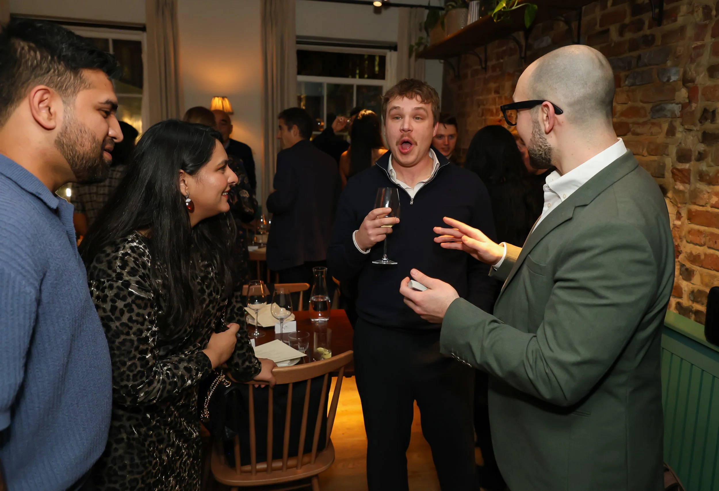 Corporate guests experiencing moments of amazement during a corporate party.