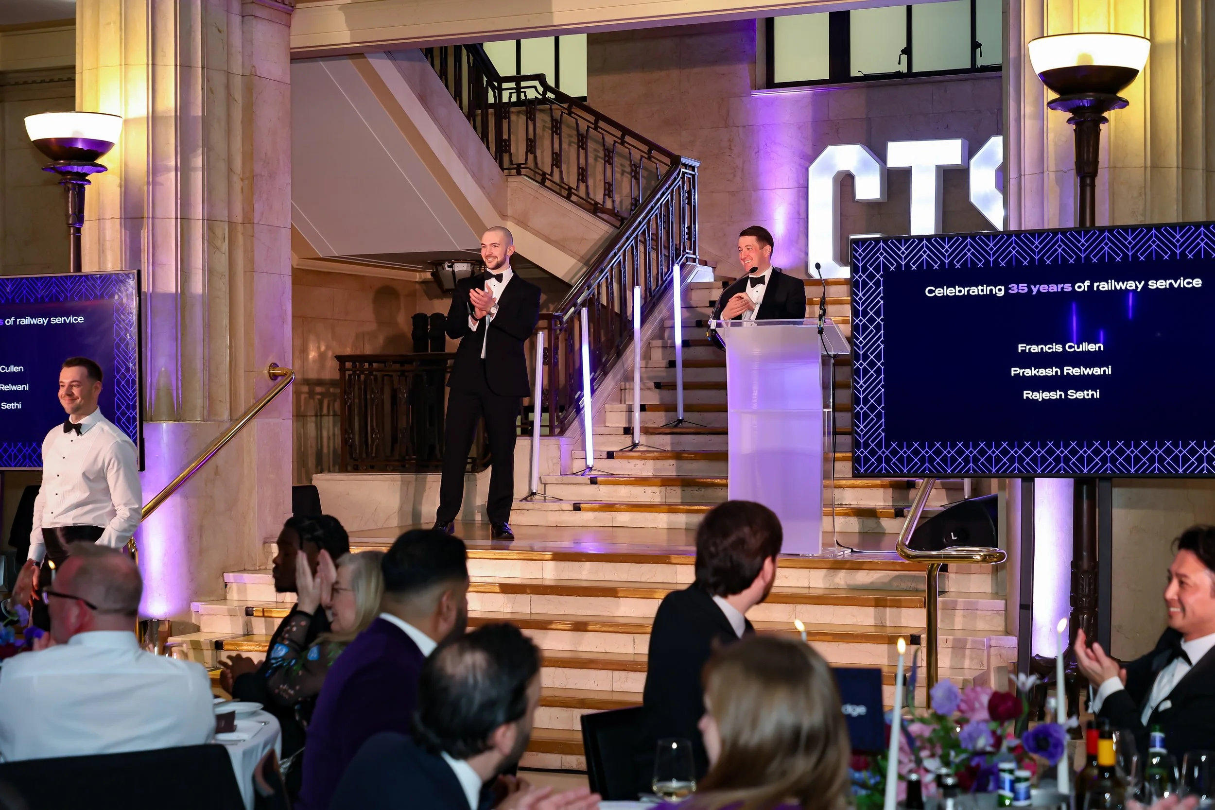 The Corporate representative giving speech to the audience. 