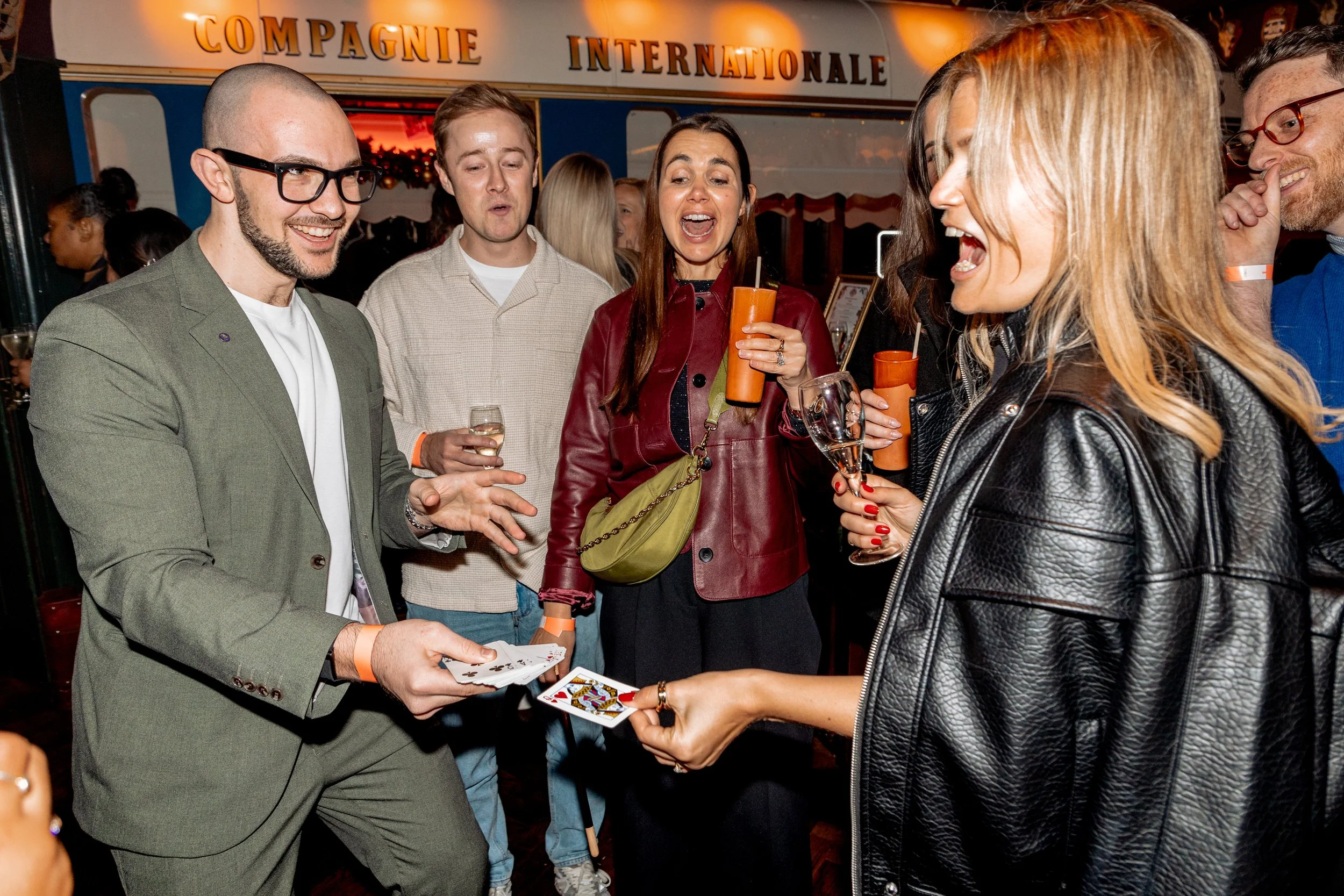 Walk-around magic performance at London corporate party.