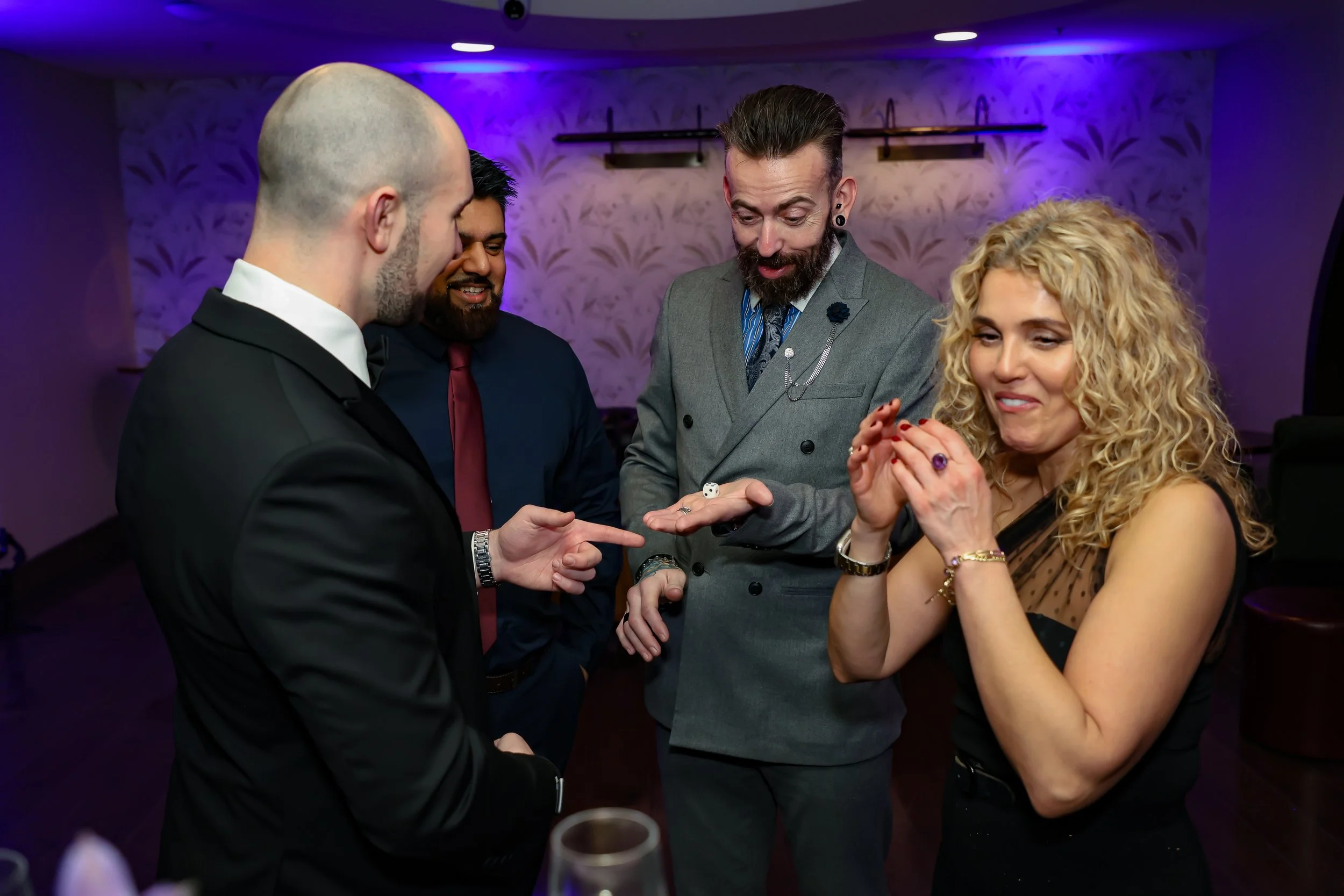 Corporate employees having s great time with the UK Magician. 