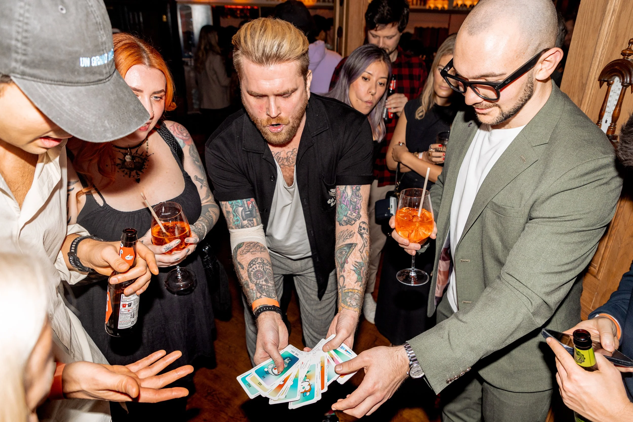 Guest focus on choosing card during event reception. 