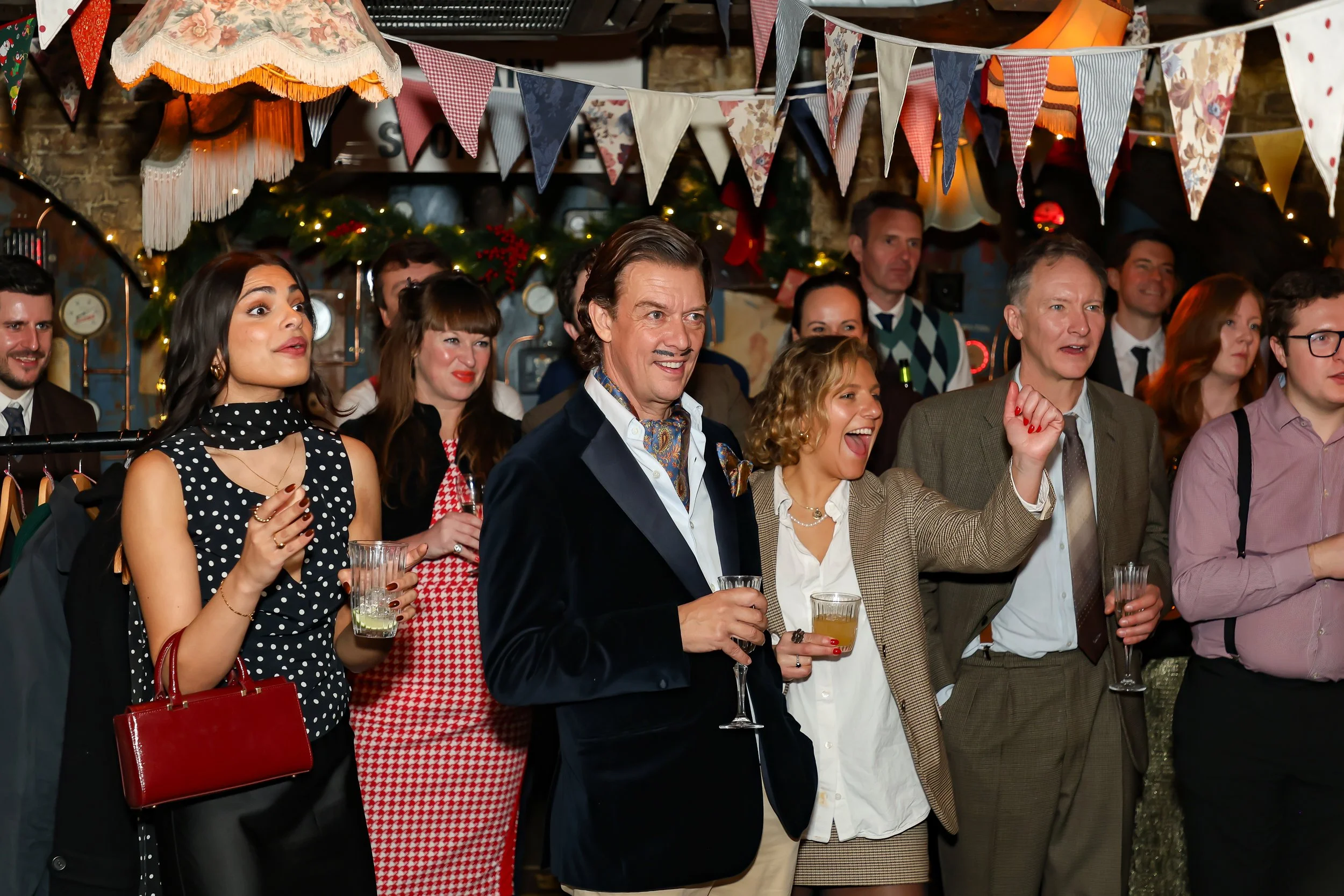 Interactive walk-around magic during corporate event reception.