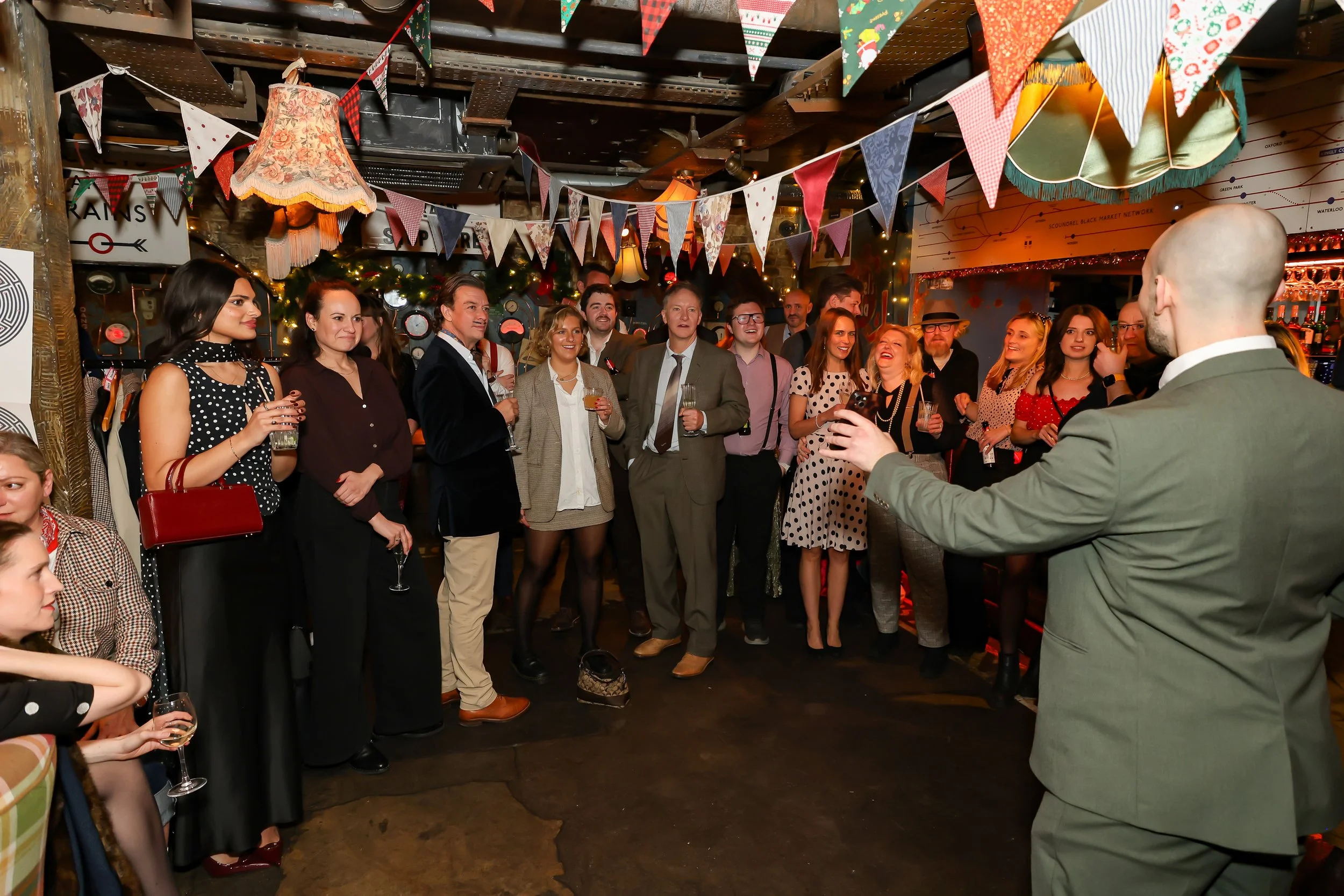 Magician entertaining guests with walk-around magic during reception