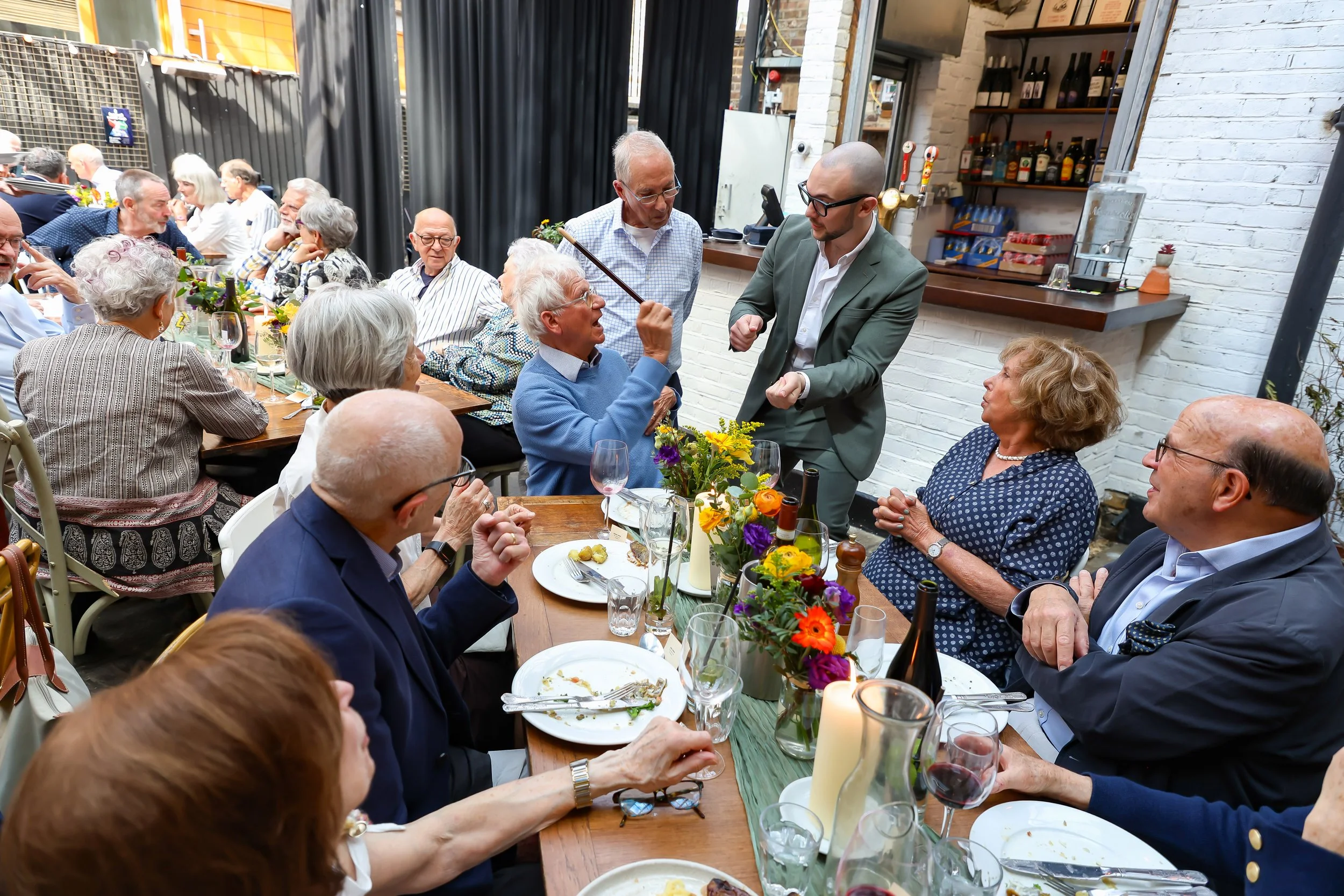 Splendid moment with the magician. 2026-May 3 Rhoda & Baruch Golden Wedding Anniversary. vvvvvvvvvvvvvv