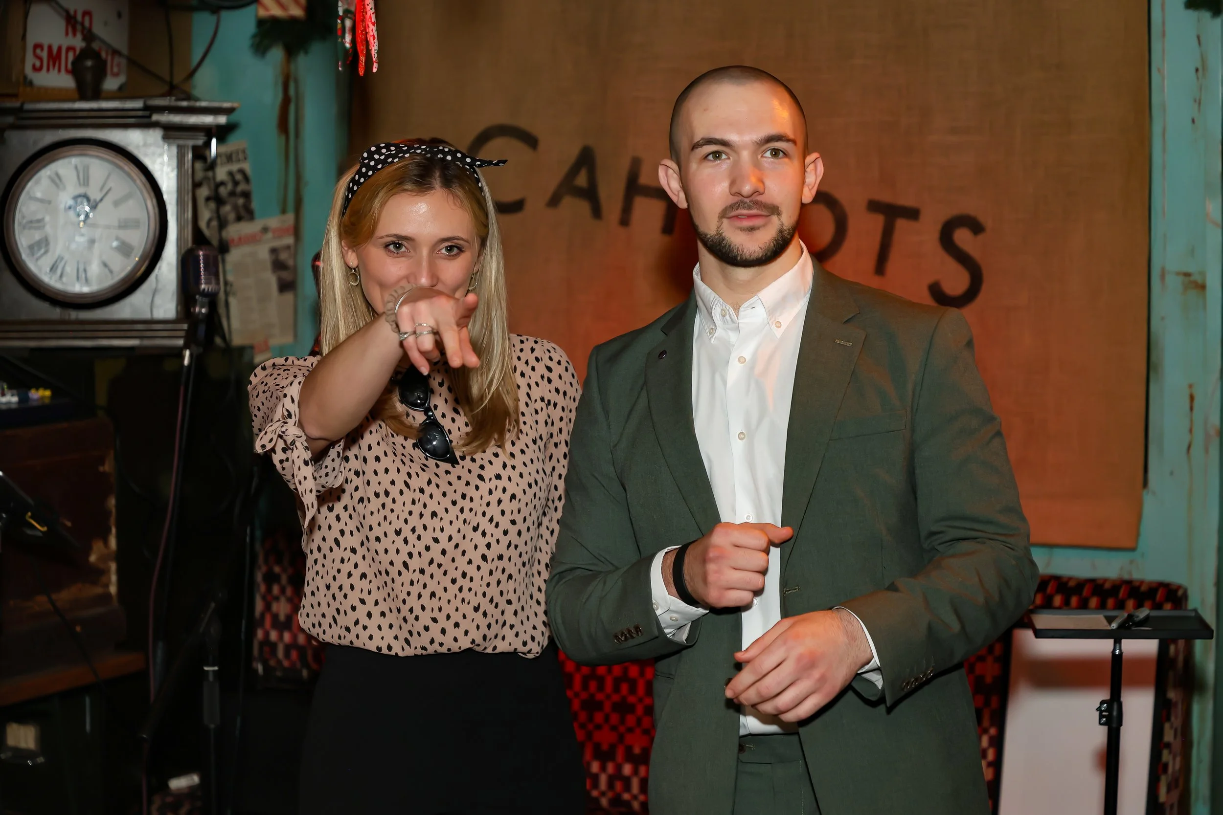 London magician posing with company employee during a corporate event.