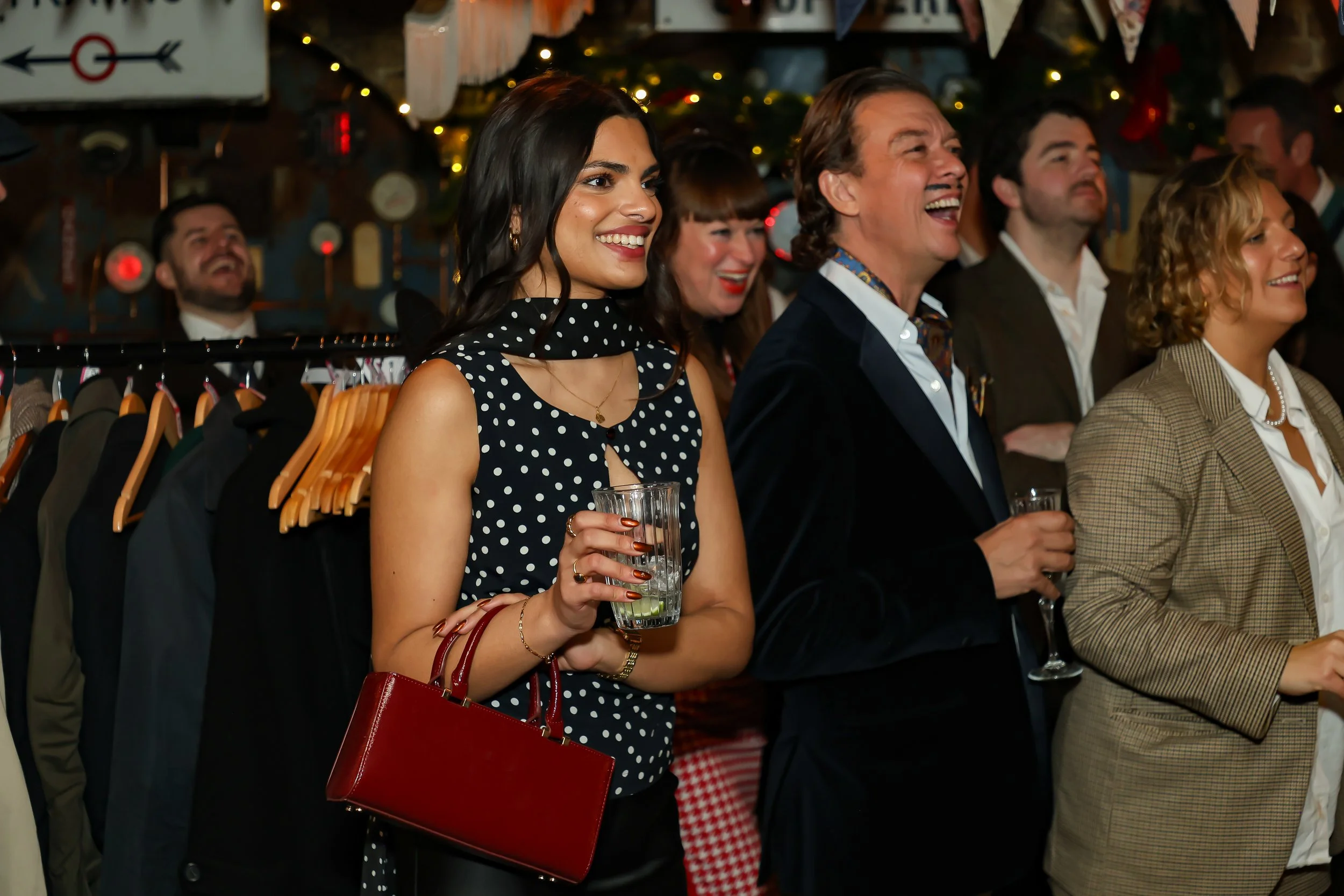 Interactive walk-around magic during corporate event reception.