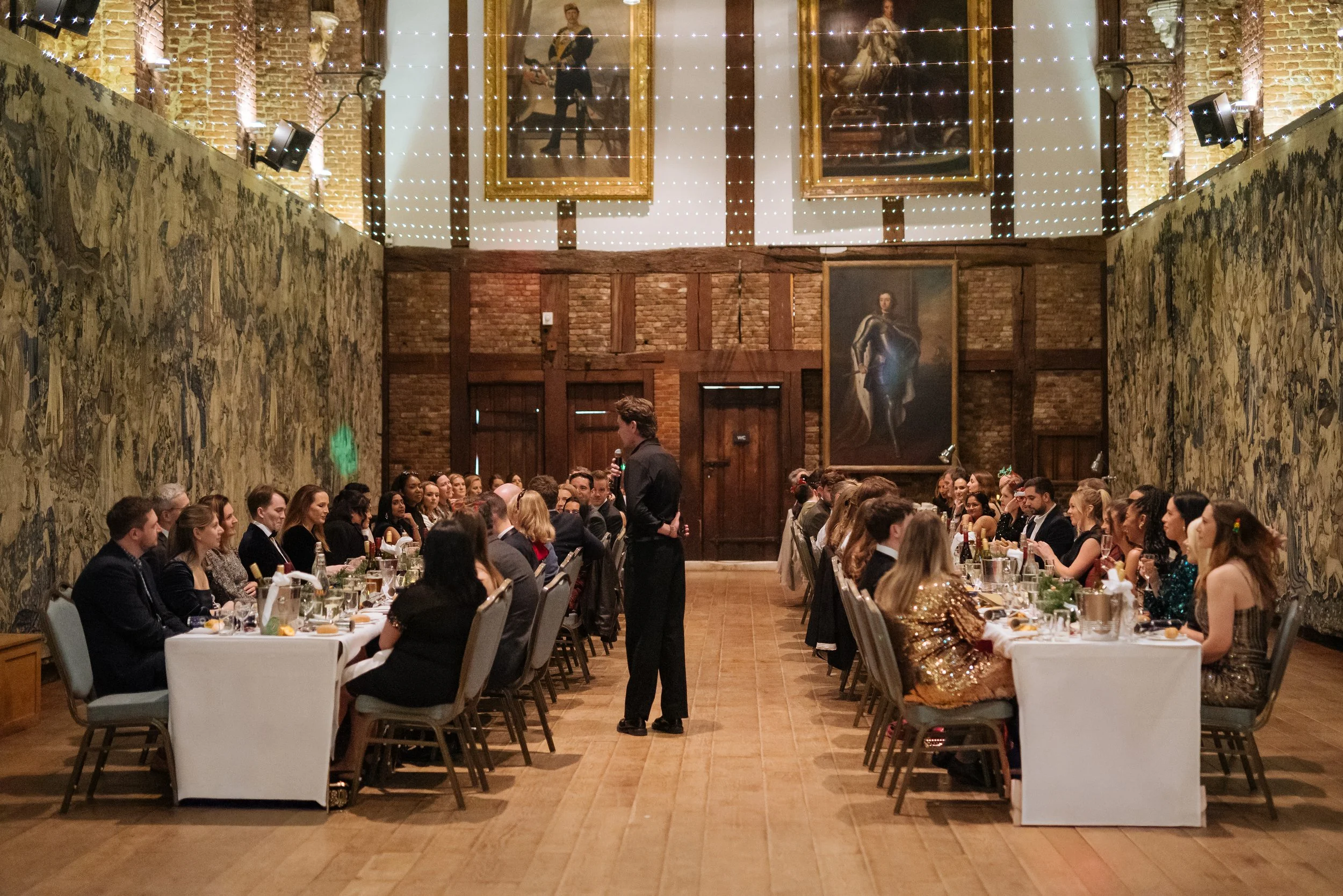 Attendees socialising at a formal corporate event venue in London.