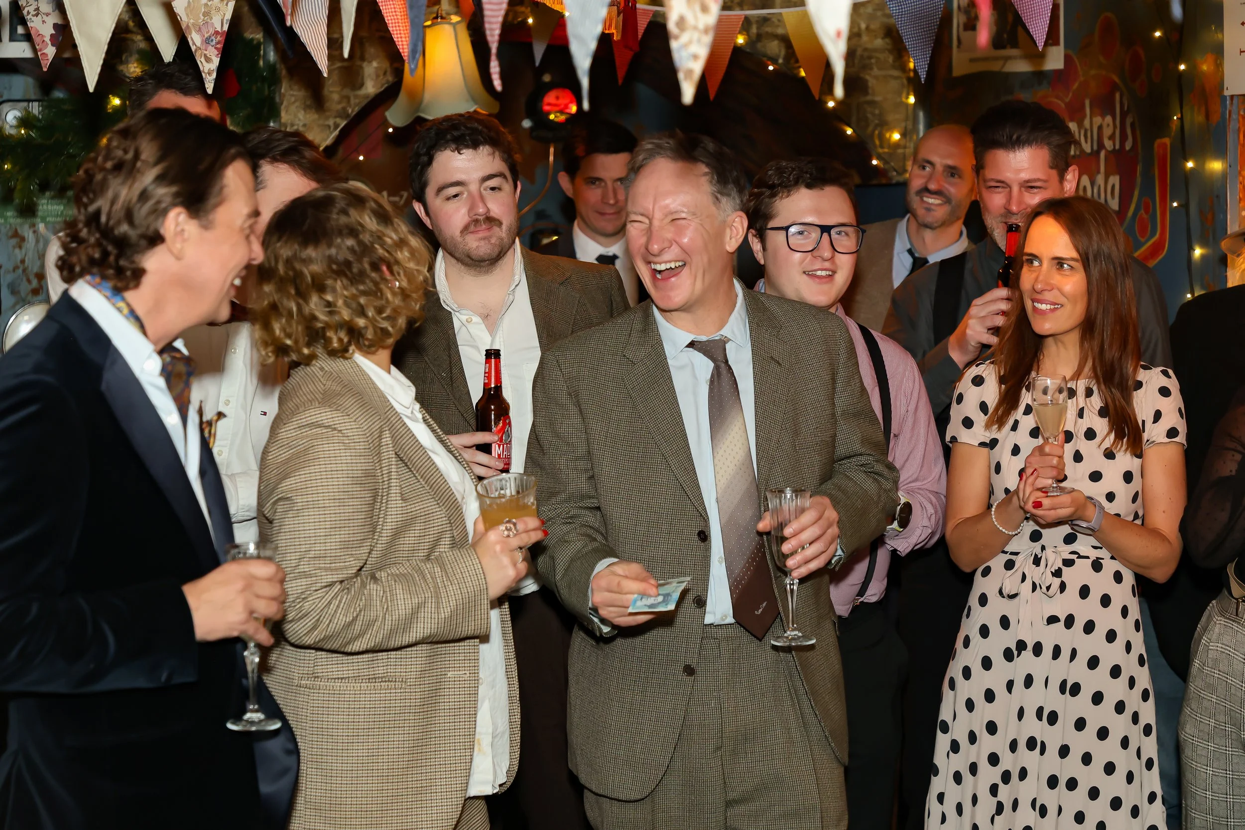 Interactive walk-around magic during corporate event reception.