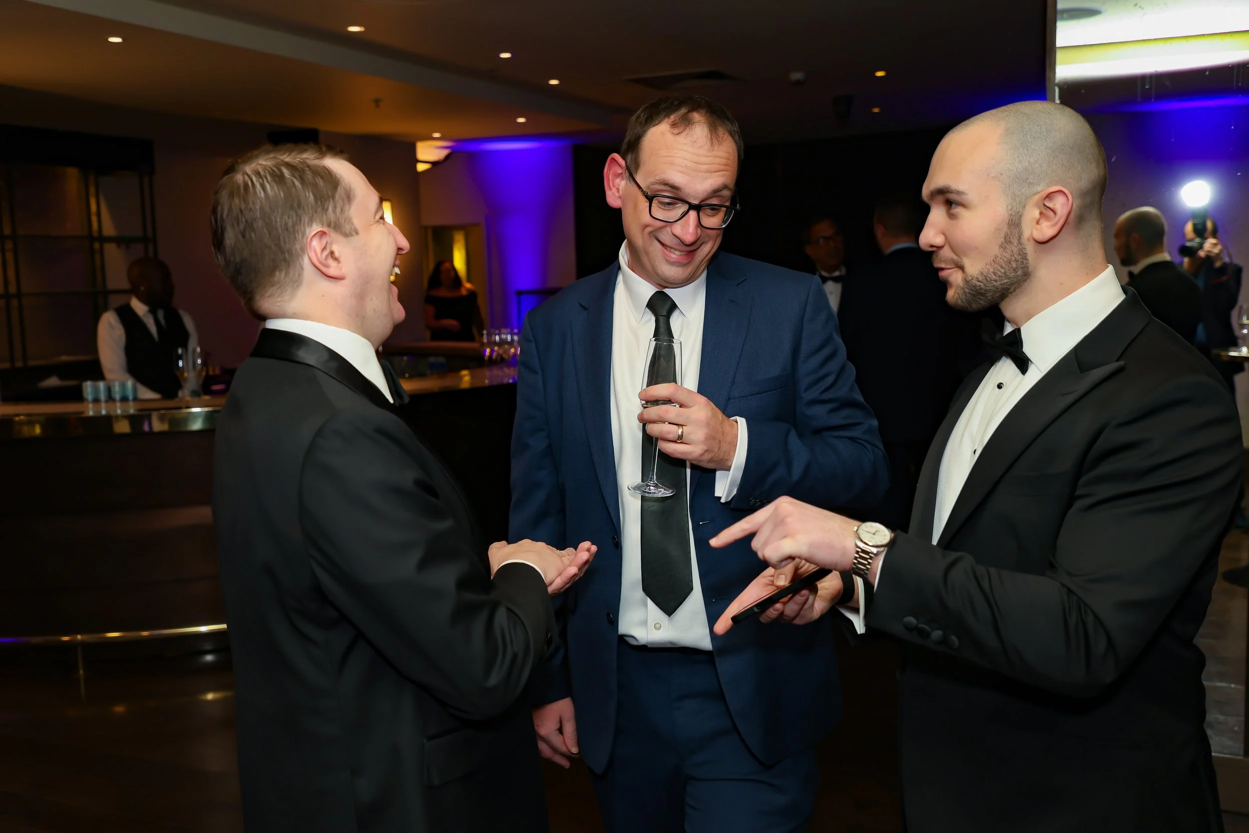 Corporate leaders enjoyed the company of the magician. 