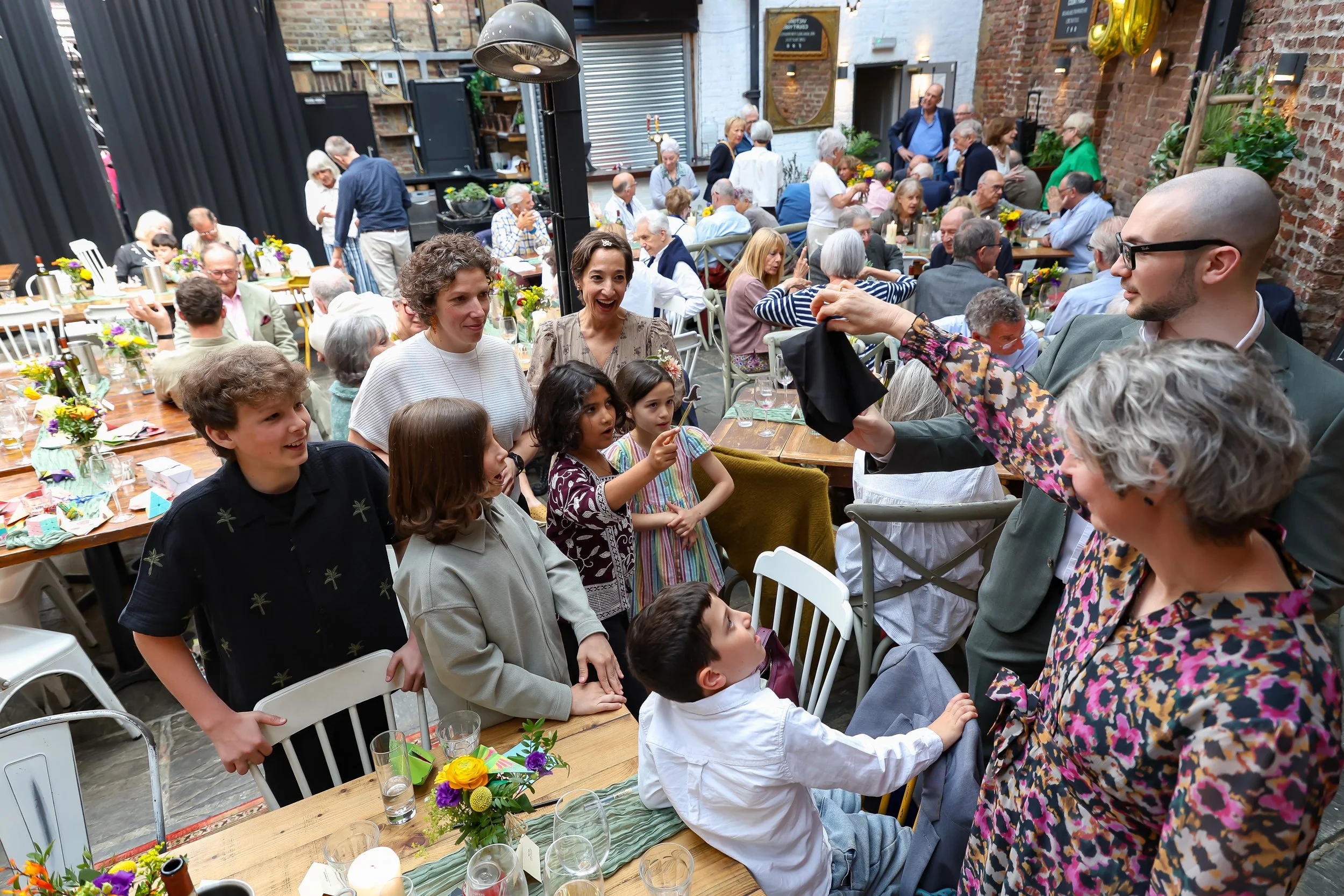 Magical moment with the amazing magician and kids. 2026-May 3 Rhoda & Baruch Golden Wedding Anniversary. 