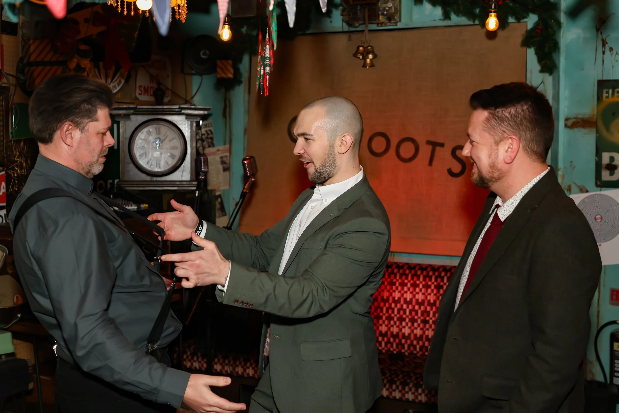 Guests enjoying hands-on interaction during a live magic show.