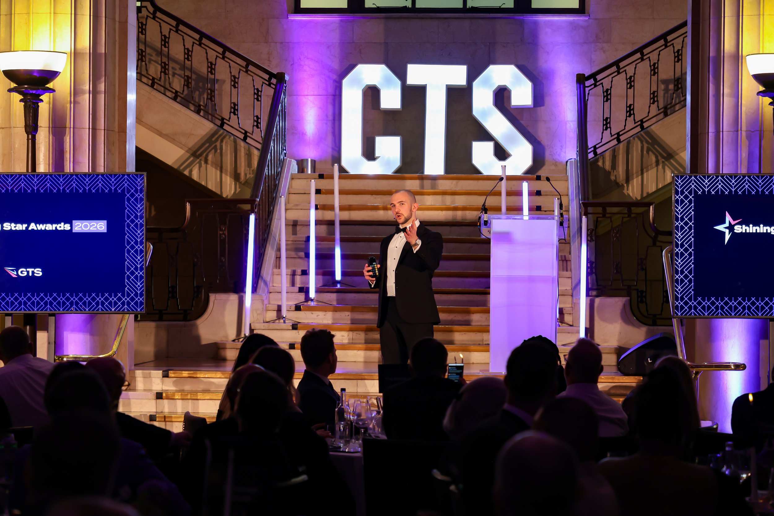 A skilled event host balancing structure and spontaneity to keep the room energised and focused.