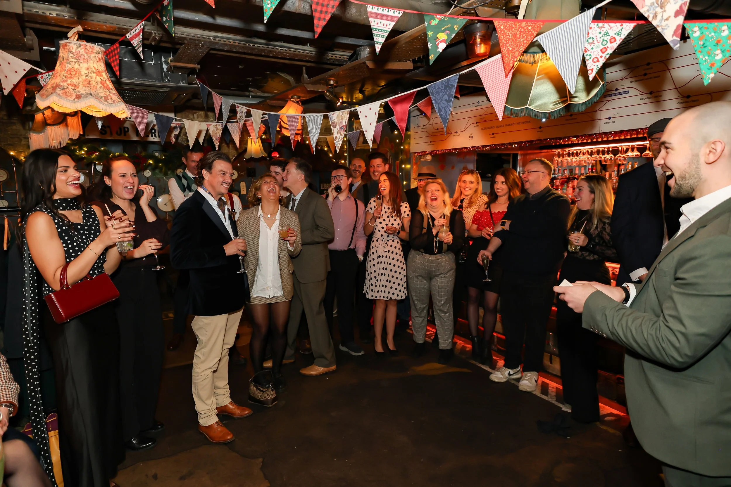 Audience enjoying the live magic show at a corporate event.