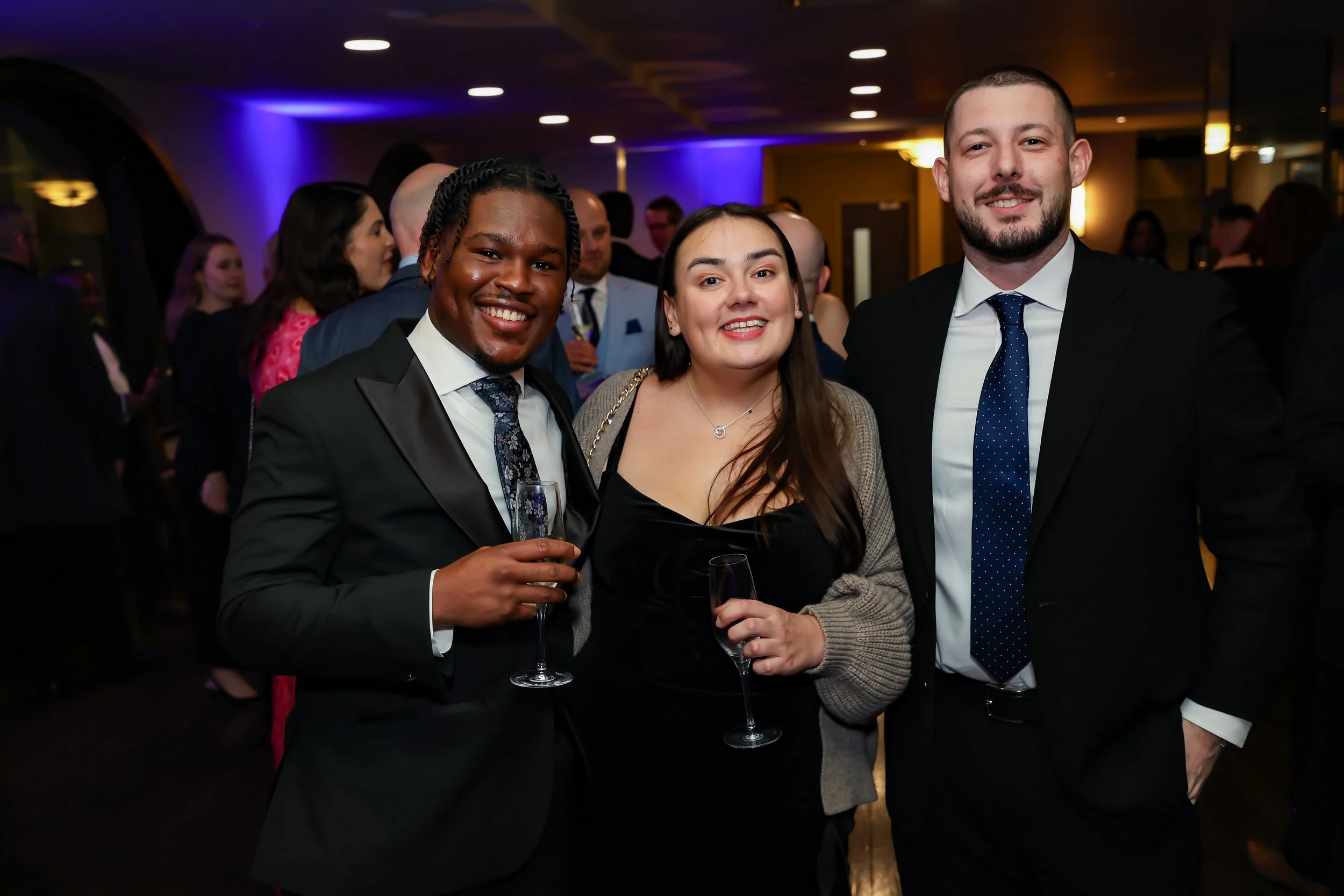 Corporate employees enjoying during event reception. 