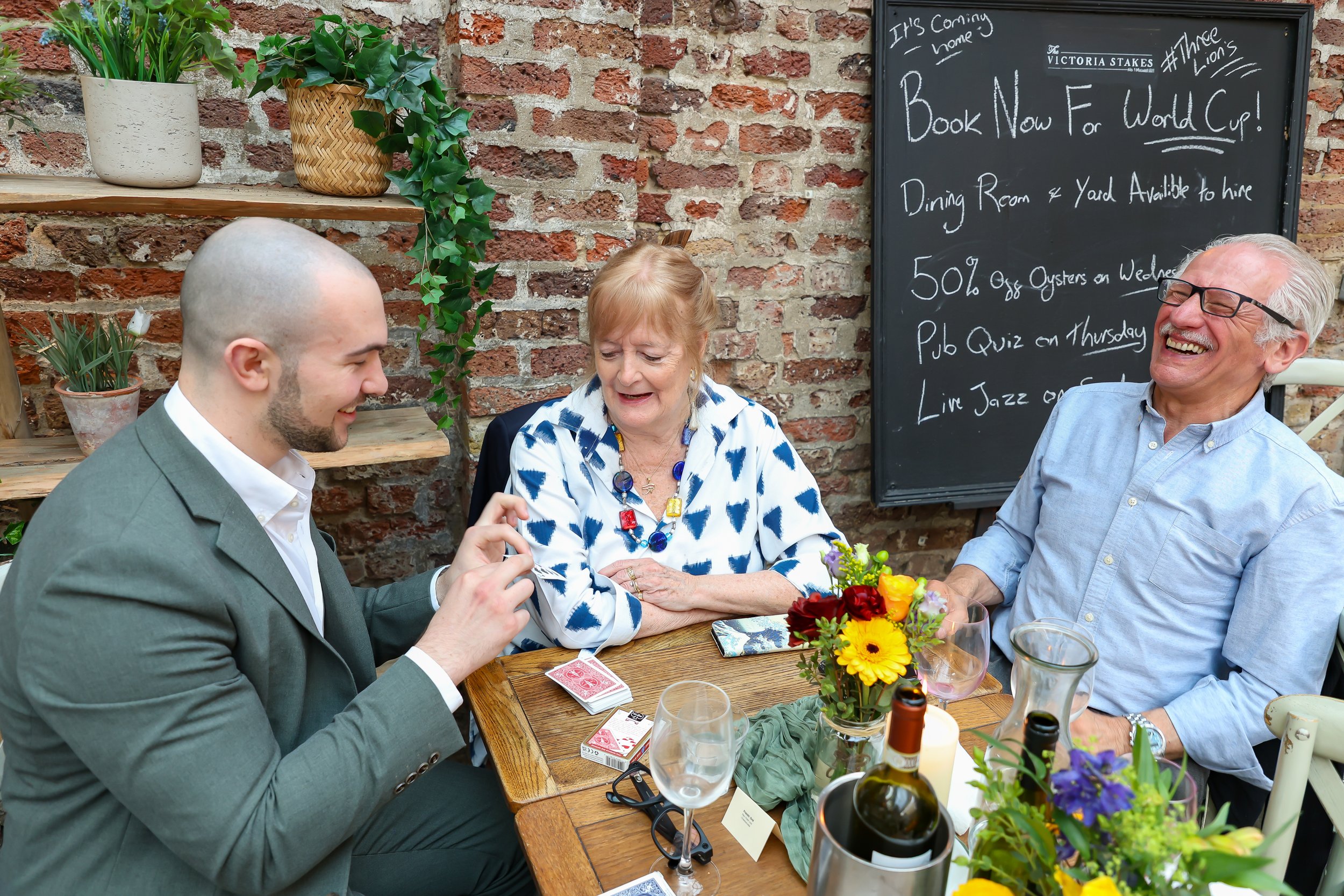 Guests love and enjoying to witness the close-up magic to happen. 2026-May 3 Rhoda & Baruch Golden Wedding Anniversary. 