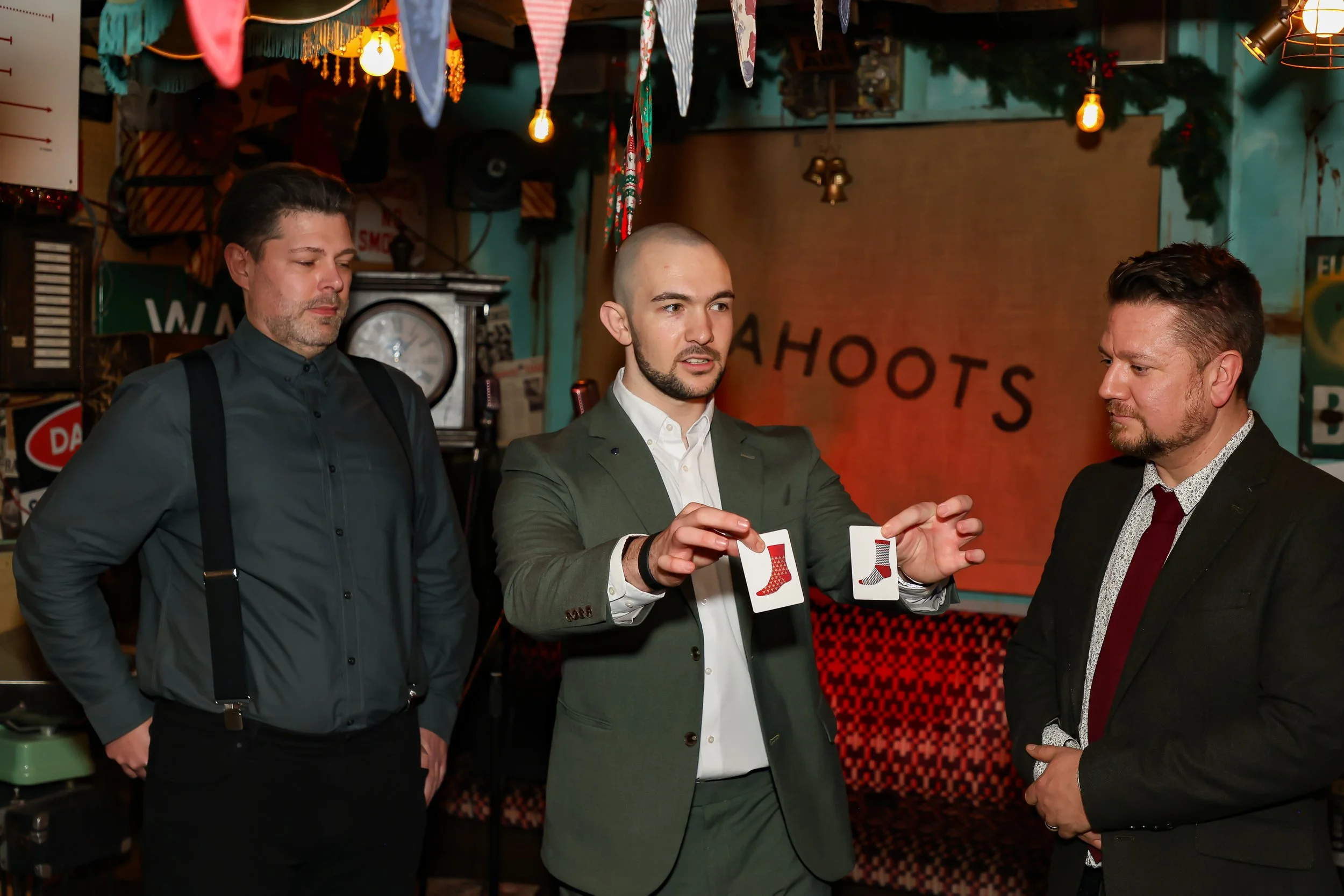 Guests actively involved in an interactive magic show during the event.