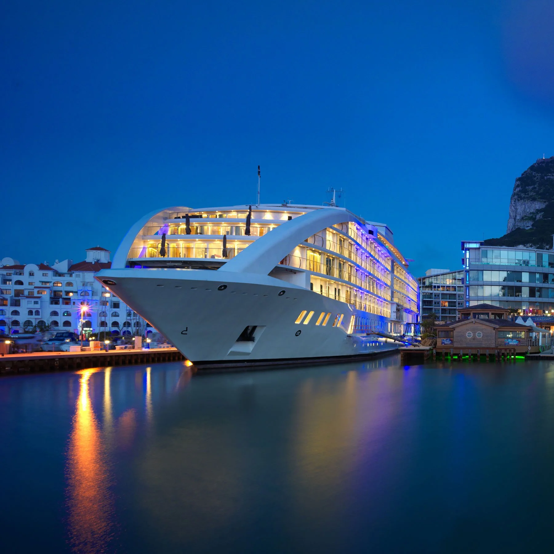 Sunborn Gibraltar floating hotel lit up at night, Ocean Village Marina, Gibraltar.