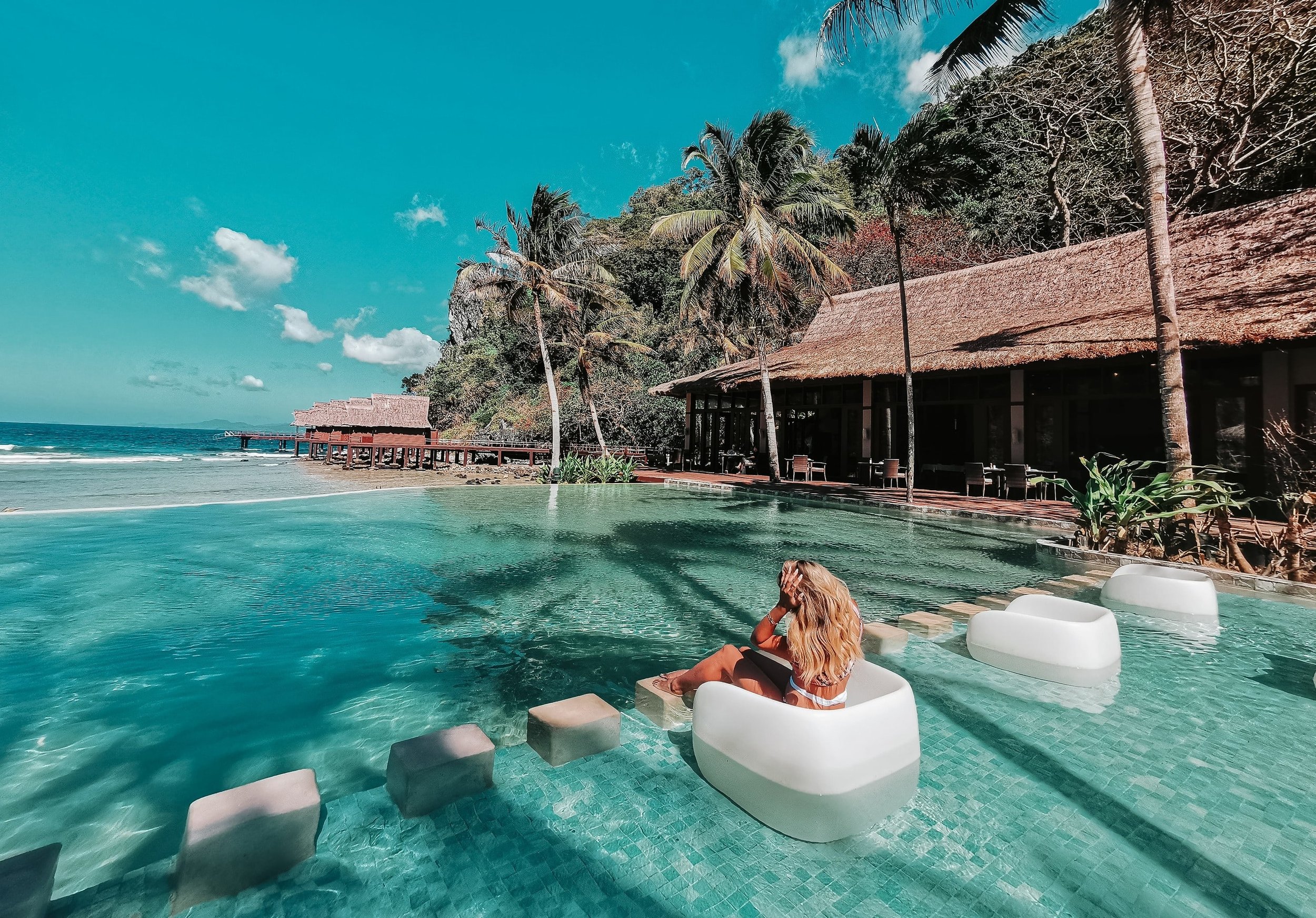 Couple at Beach Resort, Luxury Travel Agency, Shoreline Destinations