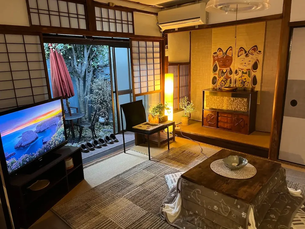 A tatami room in a restored Kyoto machiya guesthouse