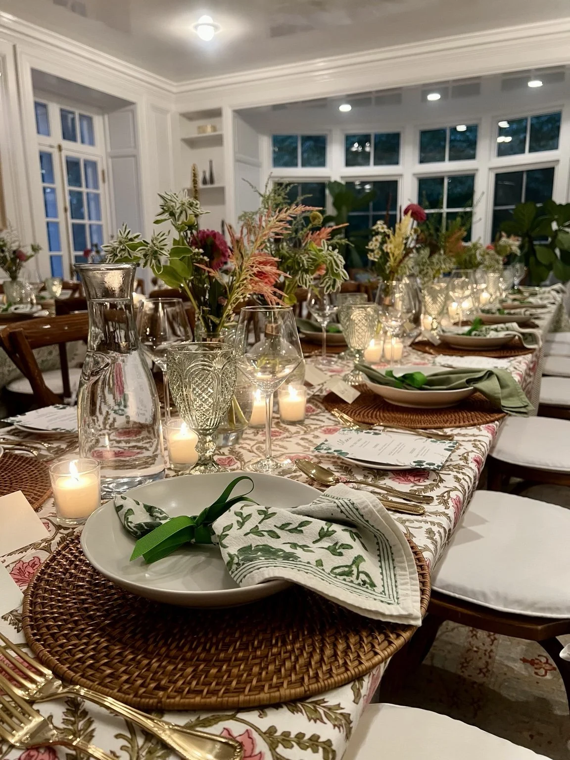 A candlelit table set for a private dinner.