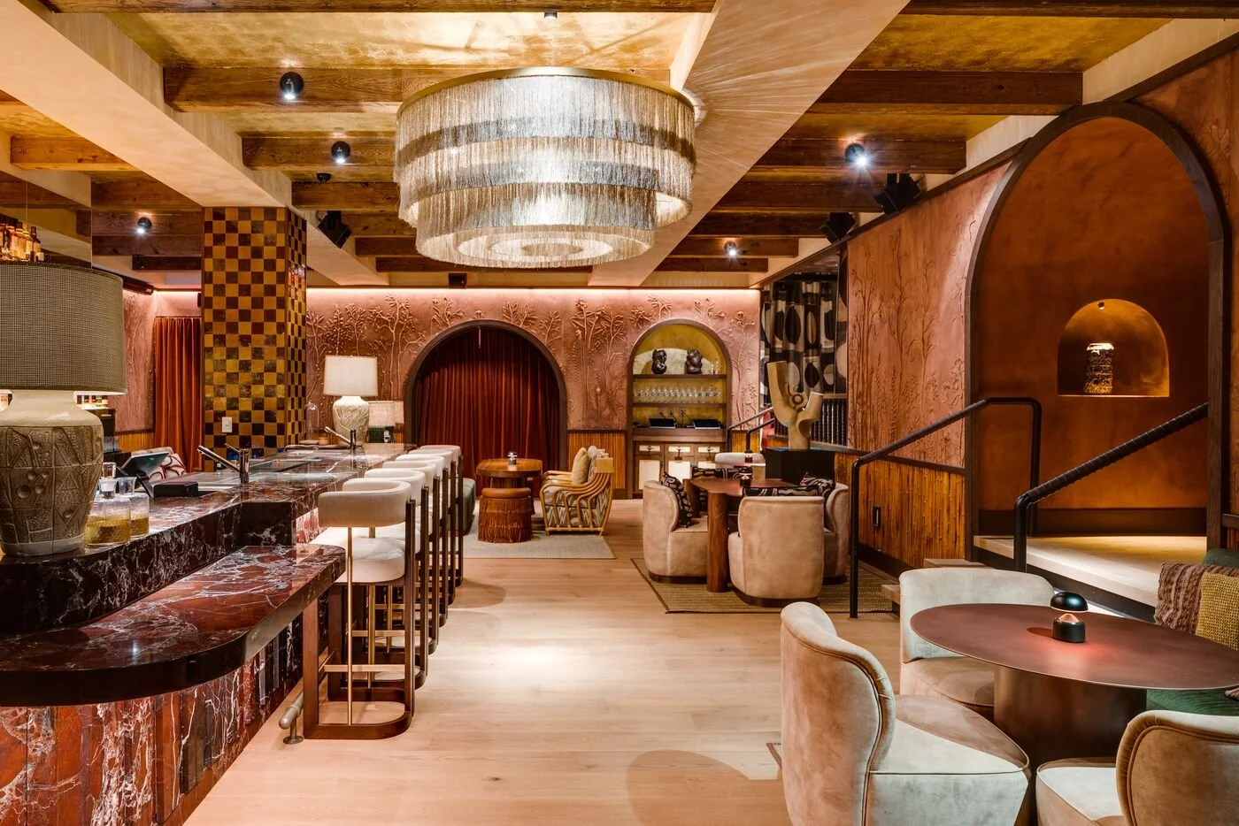 Elegant interior of MILA MM’s upscale bar and dining space in Miami Beach.