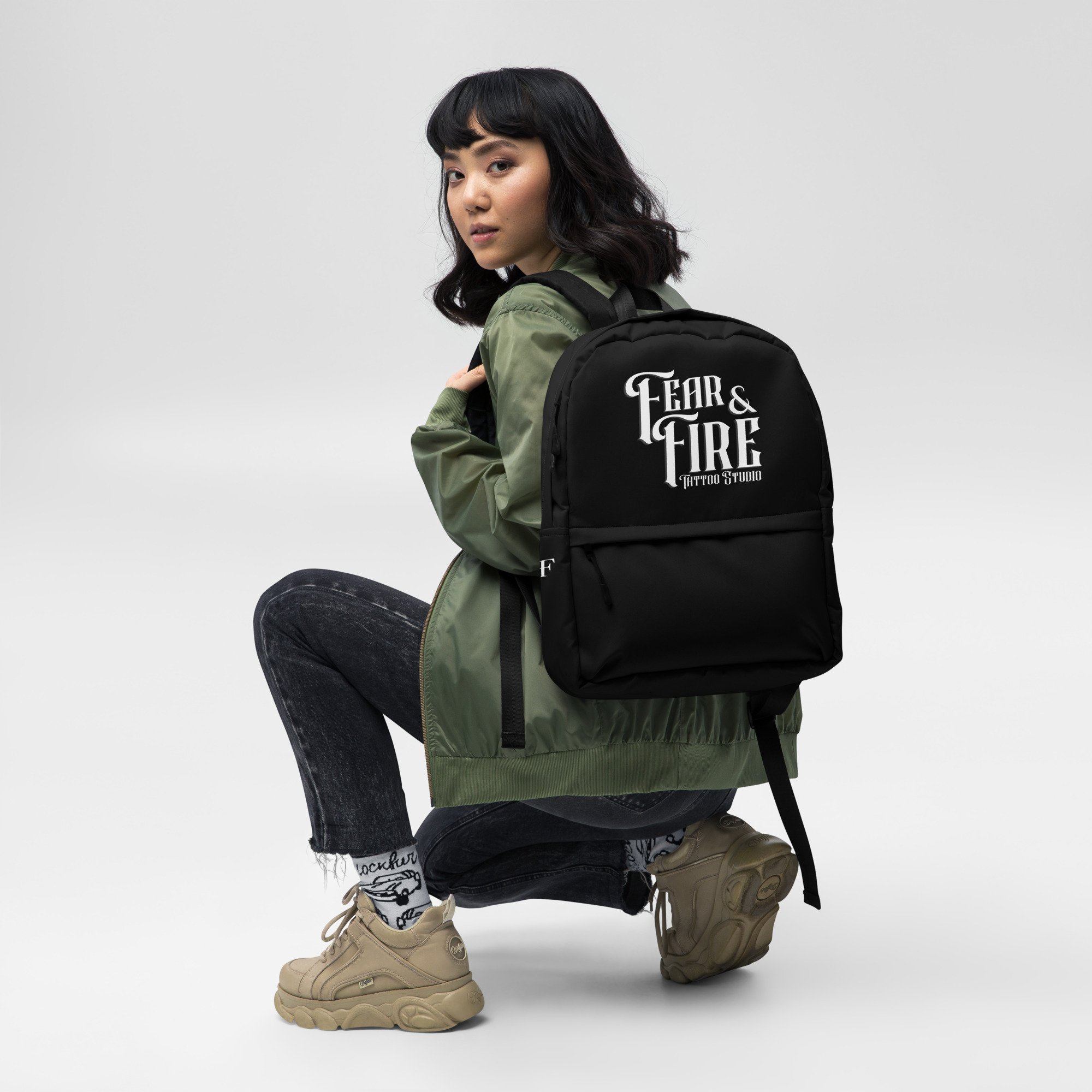all-over-print-backpack-white-front-67d772ceeec11.jpg