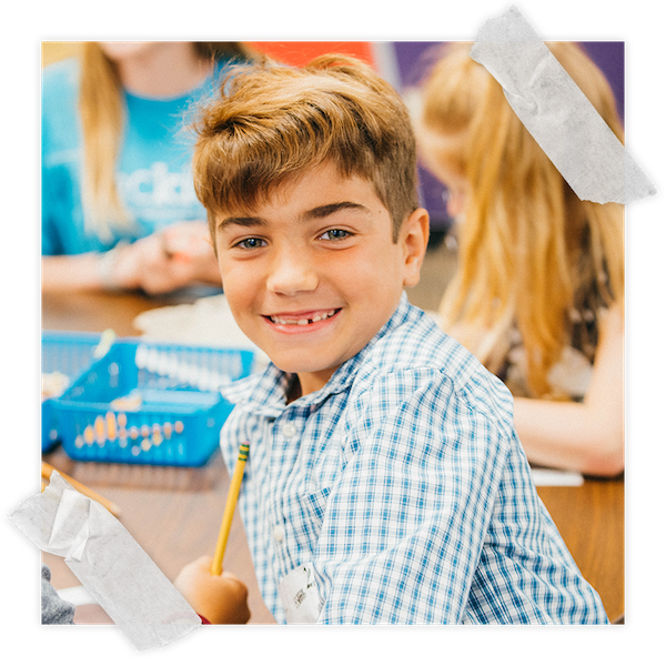 A smiling boy at SRC Kids