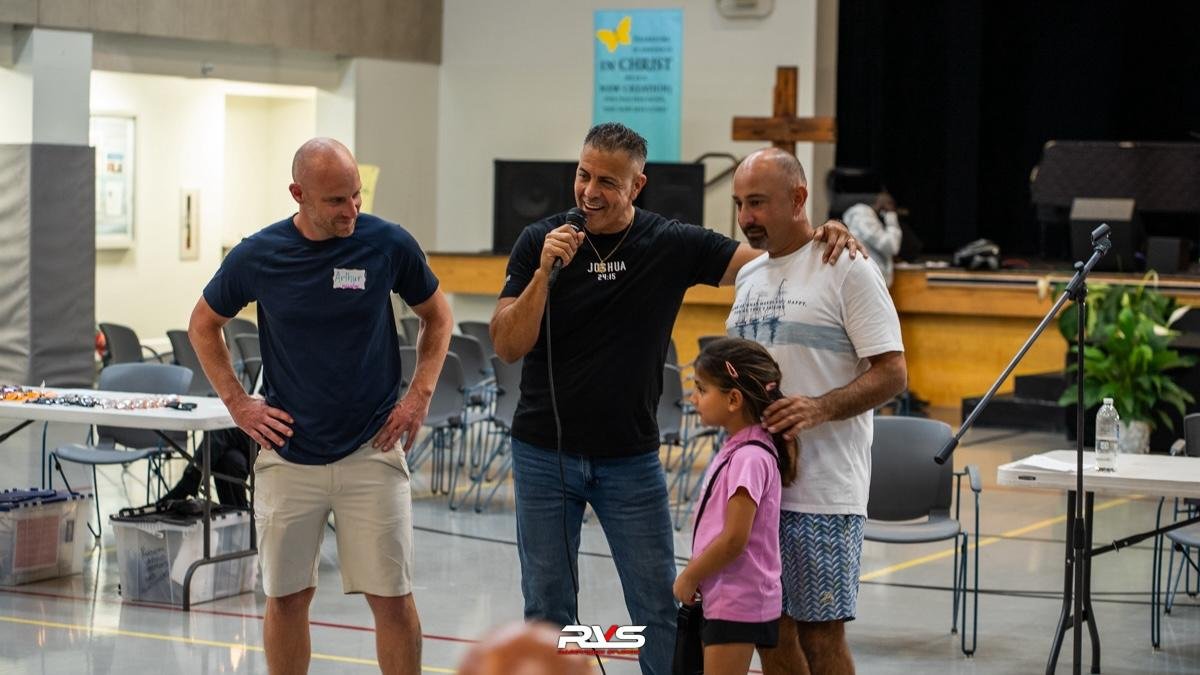 Text reads 'SERVE the city' in white brushstroke font on a teal background.